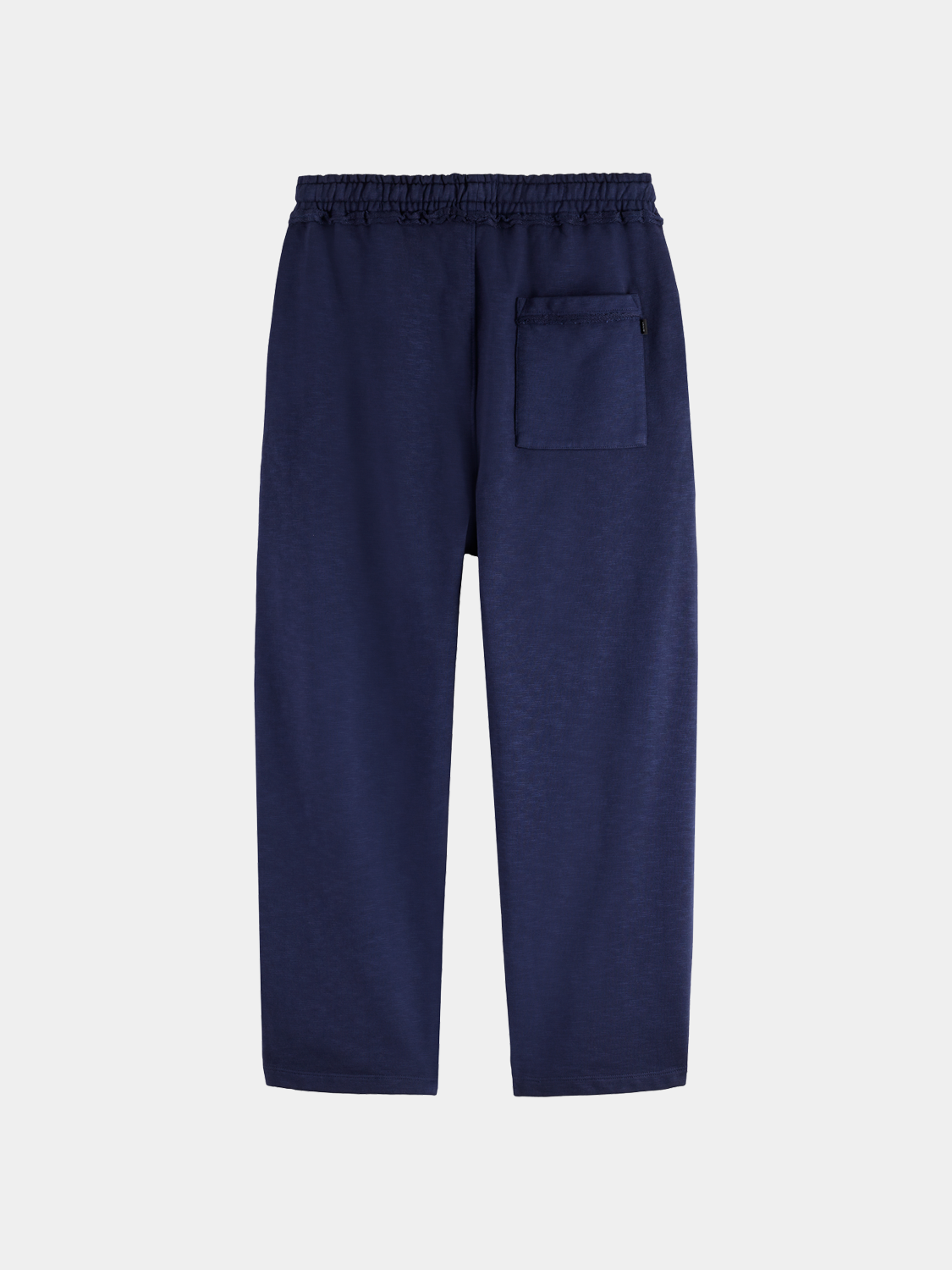 Back view of Scotch & Soda garment-dyed sweatpants showing relaxed fit and soft cotton fabric.