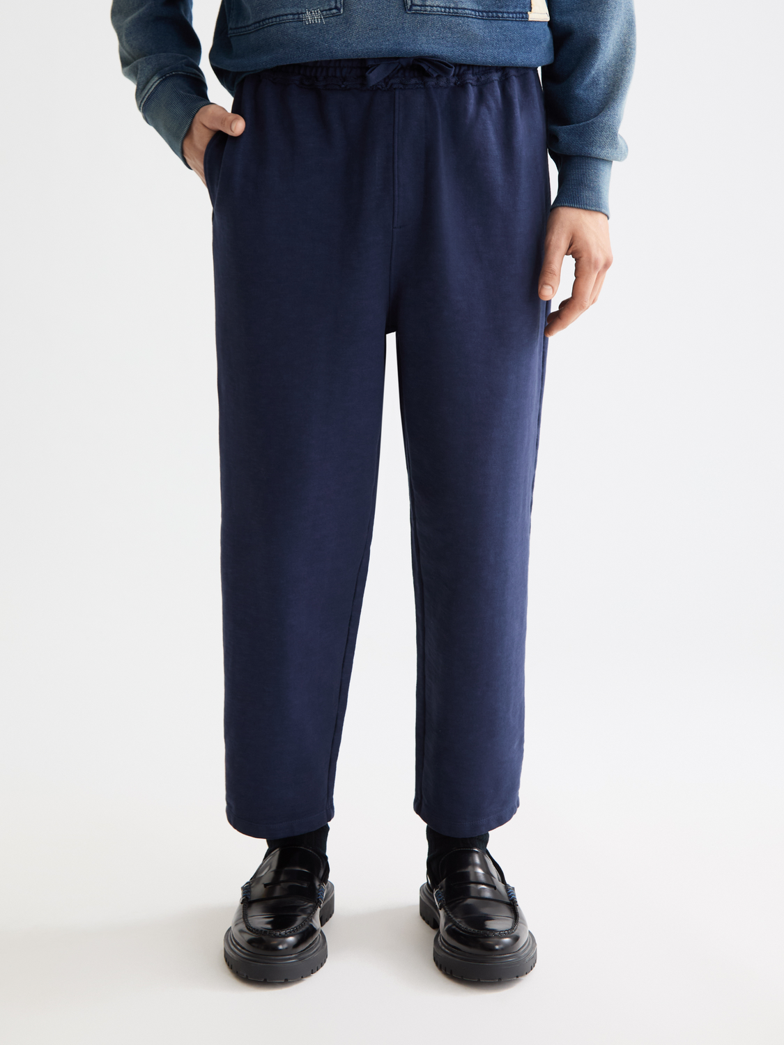 Gray garment-dyed sweatpants by Scotch & Soda with relaxed fit, showcasing soft fabric and comfortable waistband.