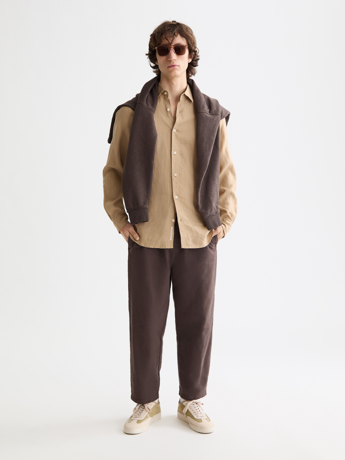 A men's long-sleeve linen shirt from Scotch & Soda featuring a relaxed fit and natural fabric in a light, breathable style.