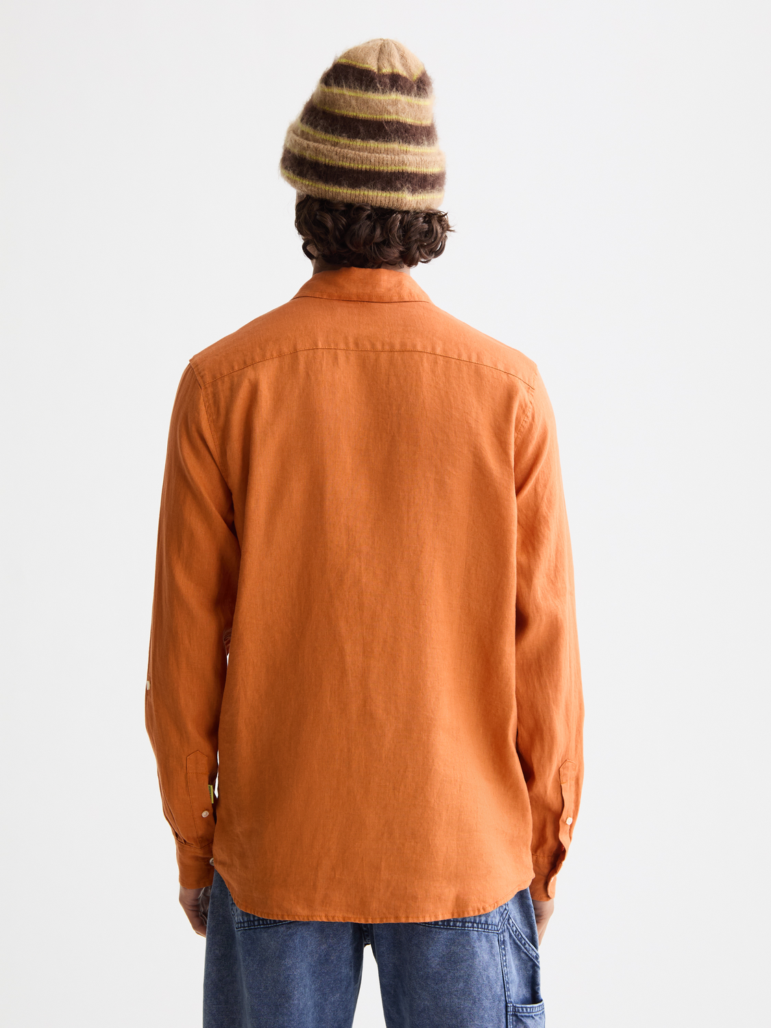 Long-sleeve linen shirt by Scotch & Soda featuring a relaxed fit, soft fabric, and casual style, shown from the back.