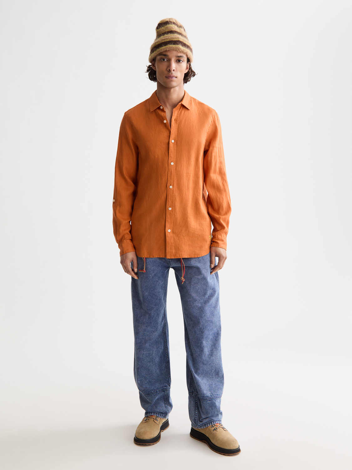 Long-sleeve linen shirt by Scotch & Soda, shown in a natural light, with a relaxed fit and classic collar style.