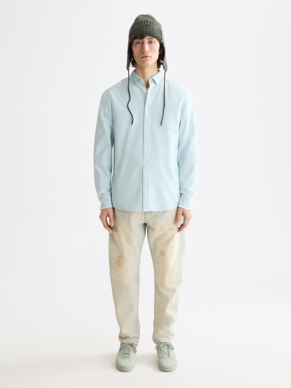Long-sleeve striped Oxford shirt by Scotch & Soda, featuring classic collar and button front, in blue and white tones.