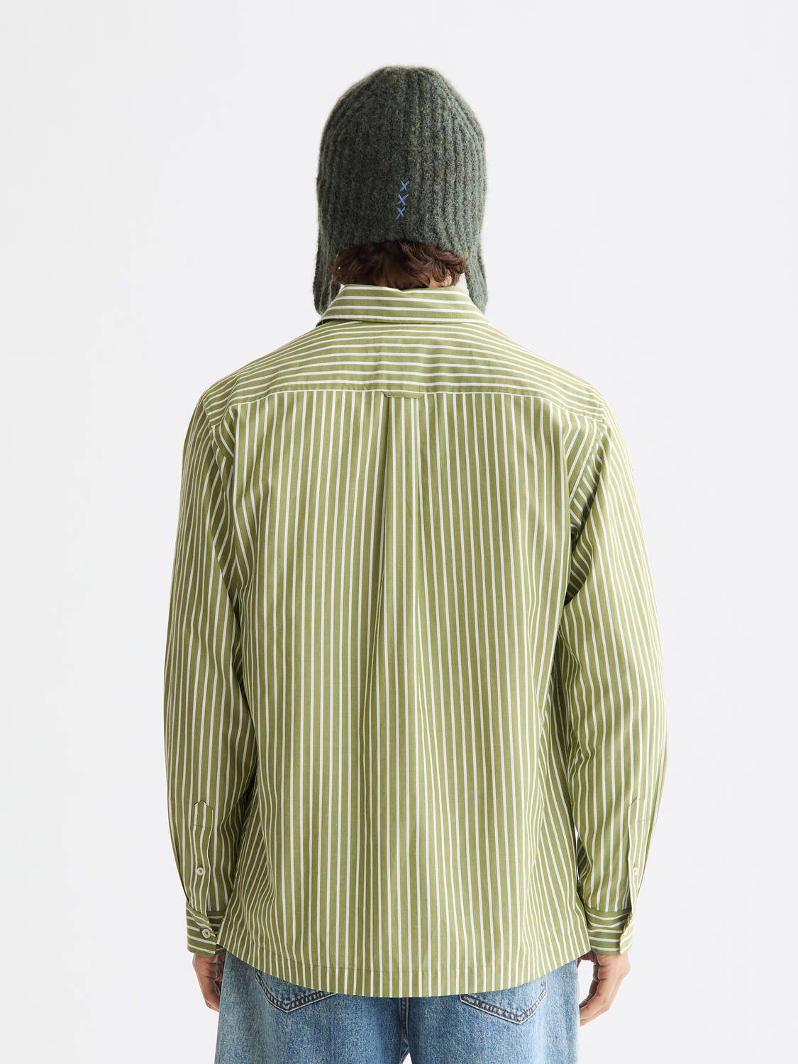 Long-sleeve striped poplin shirt by Scotch & Soda, showing the back view with a classic button-down design and bold stripe pattern.
