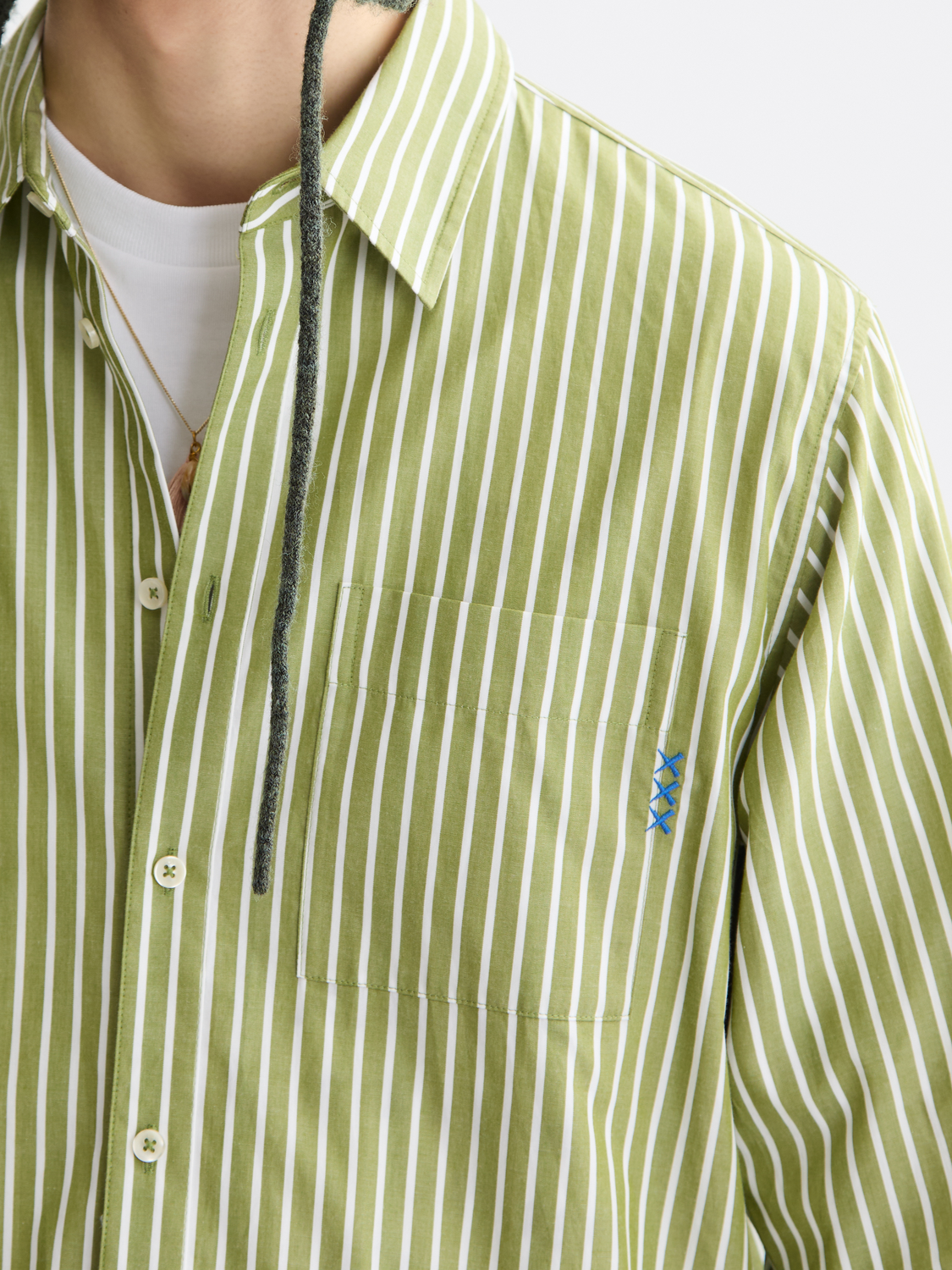 Long-sleeve striped poplin shirt by Scotch & Soda, featuring a classic button-down design and vibrant color pattern.