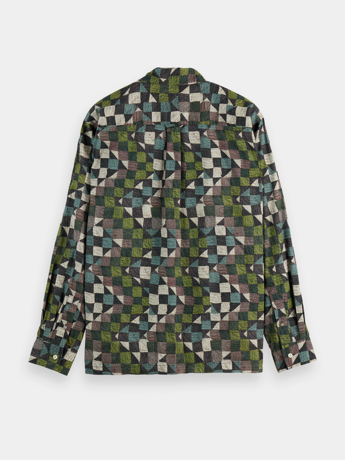 Long sleeve printed shirt from Scotch & Soda with bold patterns, shown on a model against a neutral background.
