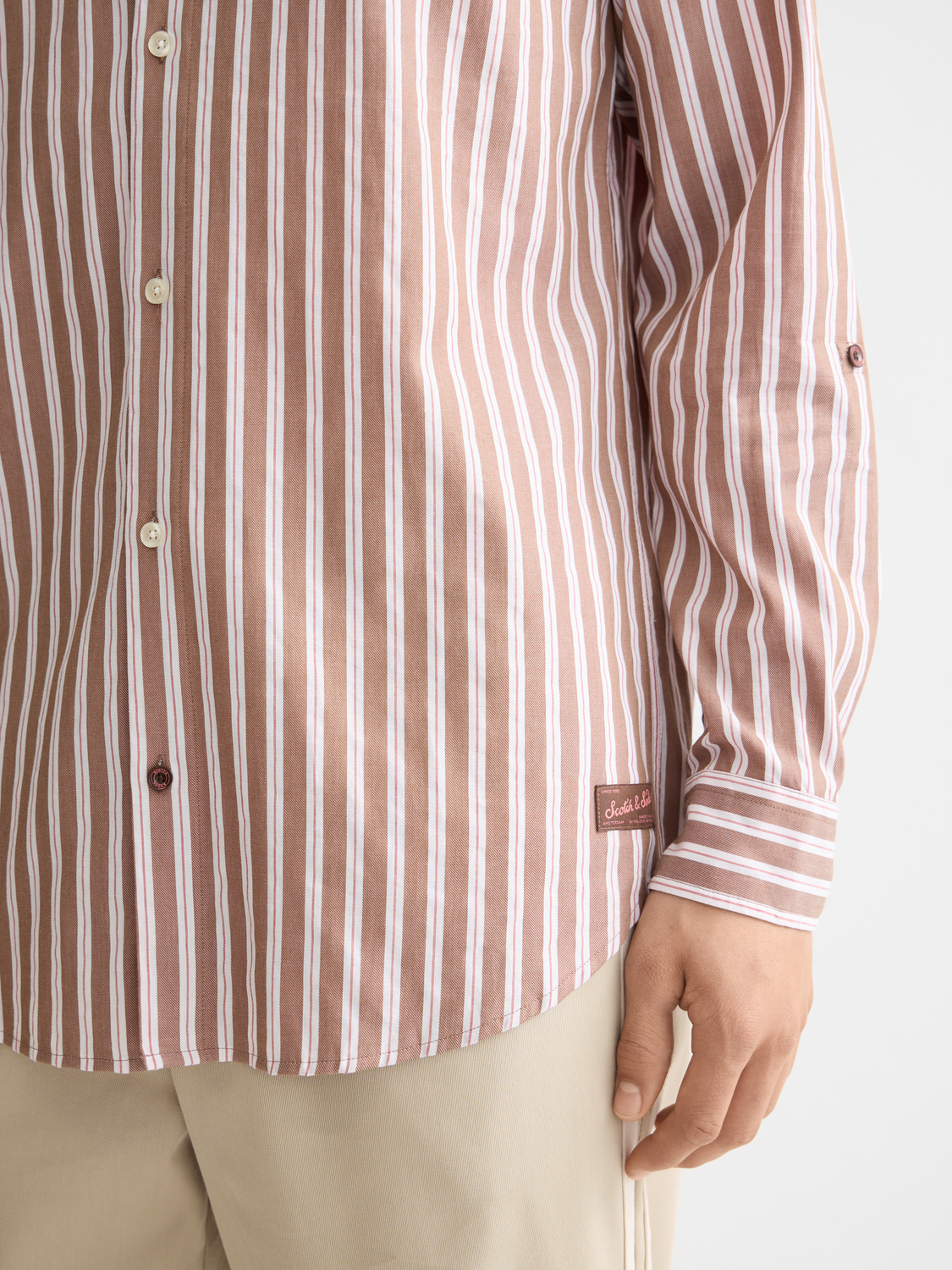 Yarn-dyed striped long sleeve shirt by Scotch & Soda featuring blue, white, and red horizontal stripes.