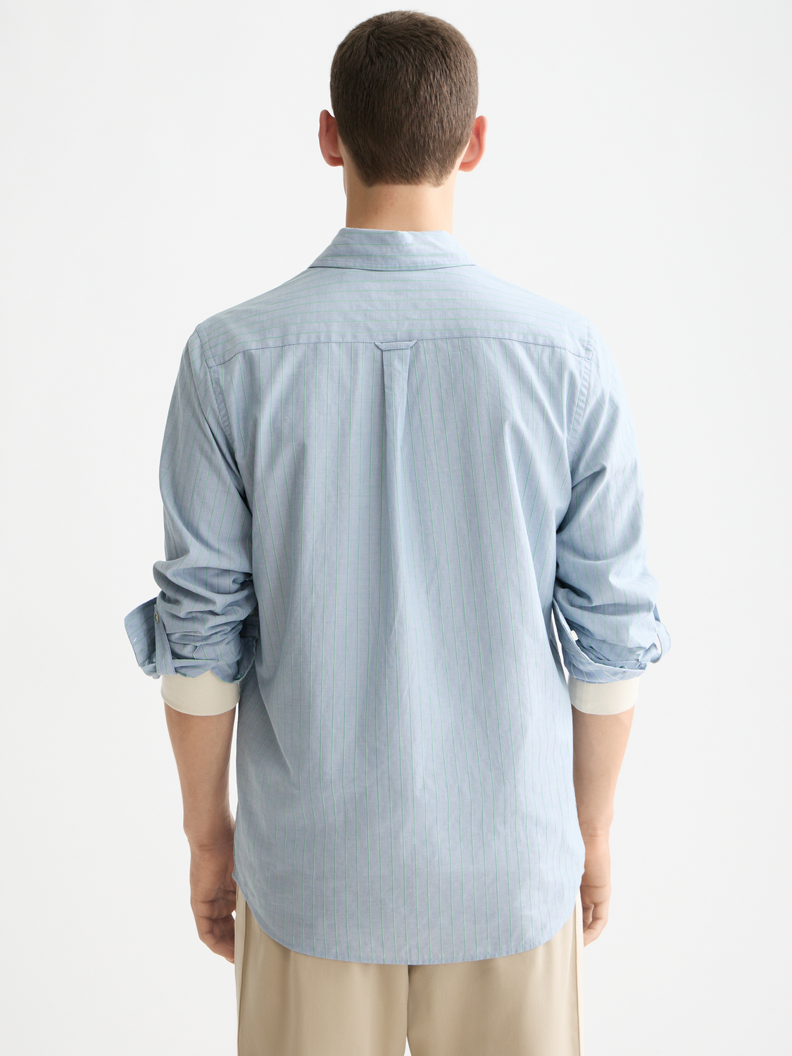 Long sleeve yarn-dyed striped shirt by Scotch & Soda, showing the back view with vibrant color stripes and classic collar.