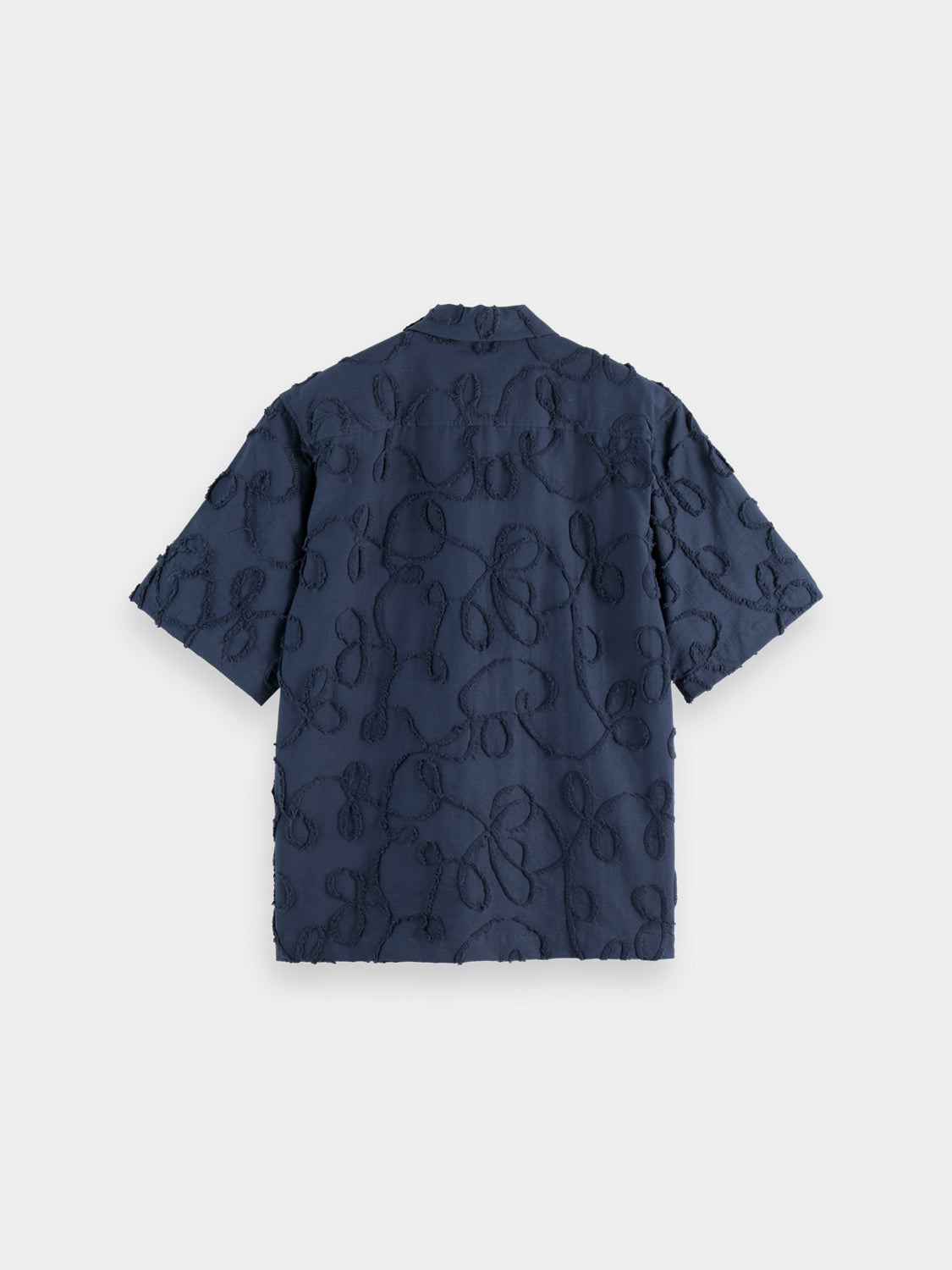 Black Scotch & Soda jacquard short-sleeved shirt with intricate woven pattern, casual style, and classic collar.