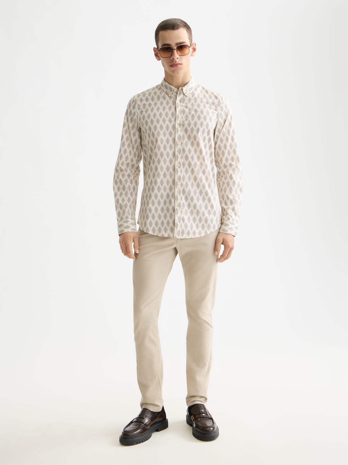 Long sleeve printed shirt by Scotch & Soda, featuring colorful pattern and casual fit, displayed on a neutral background.