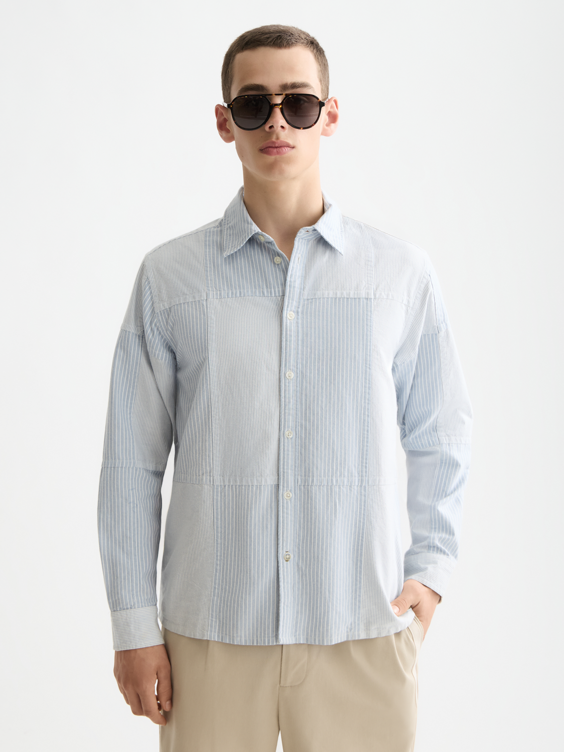 Long sleeve patchwork Oxford shirt by Scotch & Soda featuring a vibrant, multicolored design and classic collar.