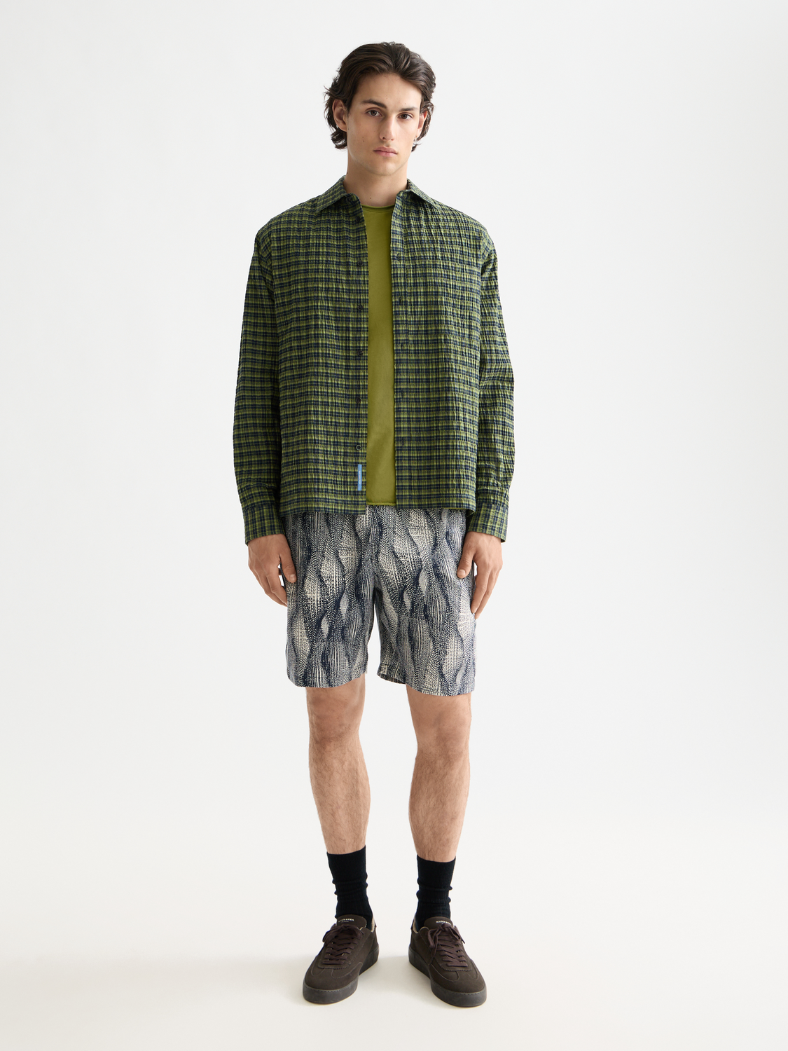 Long sleeve Scotch & Soda crinkle checked shirt with button-up front and collar, displayed on a hanger.
