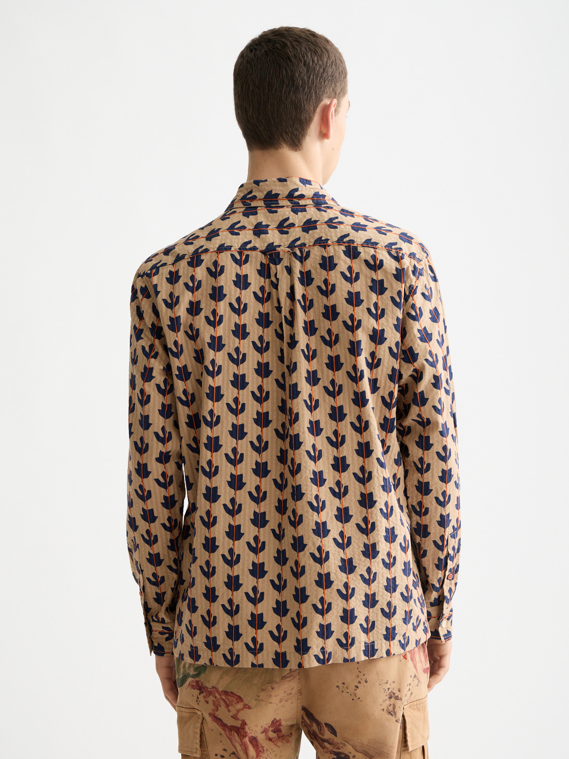 Long sleeve printed shirt from Scotch & Soda with a bold, colorful pattern and button-up front.
