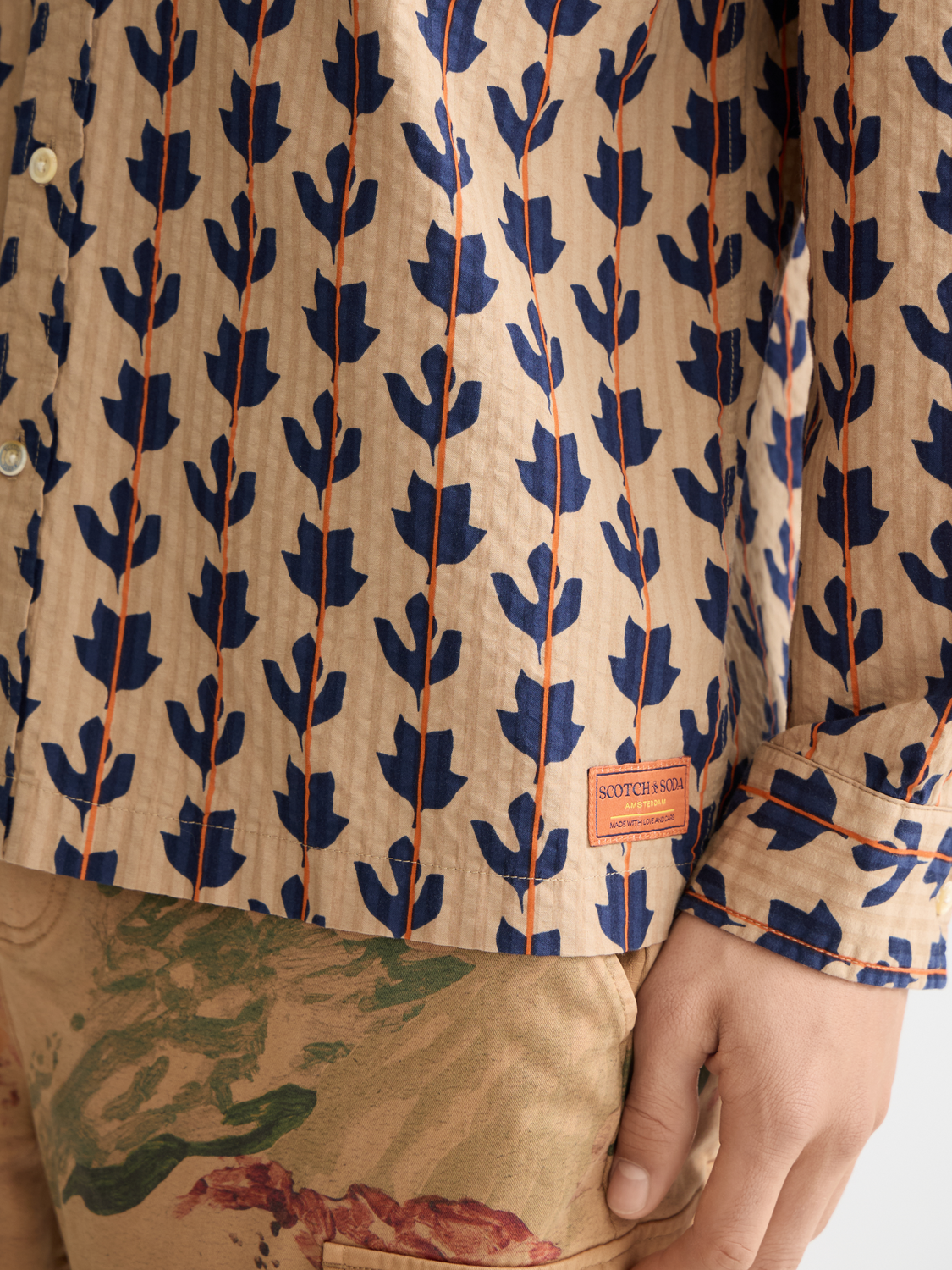 Long-sleeve printed shirt by Scotch & Soda featuring a stylish design, shown flat on a white background.