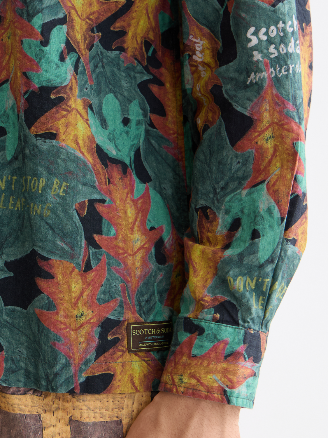 Long-sleeve printed shirt by Scotch & Soda featuring a stylish pattern and casual fit, shown on a hanger.