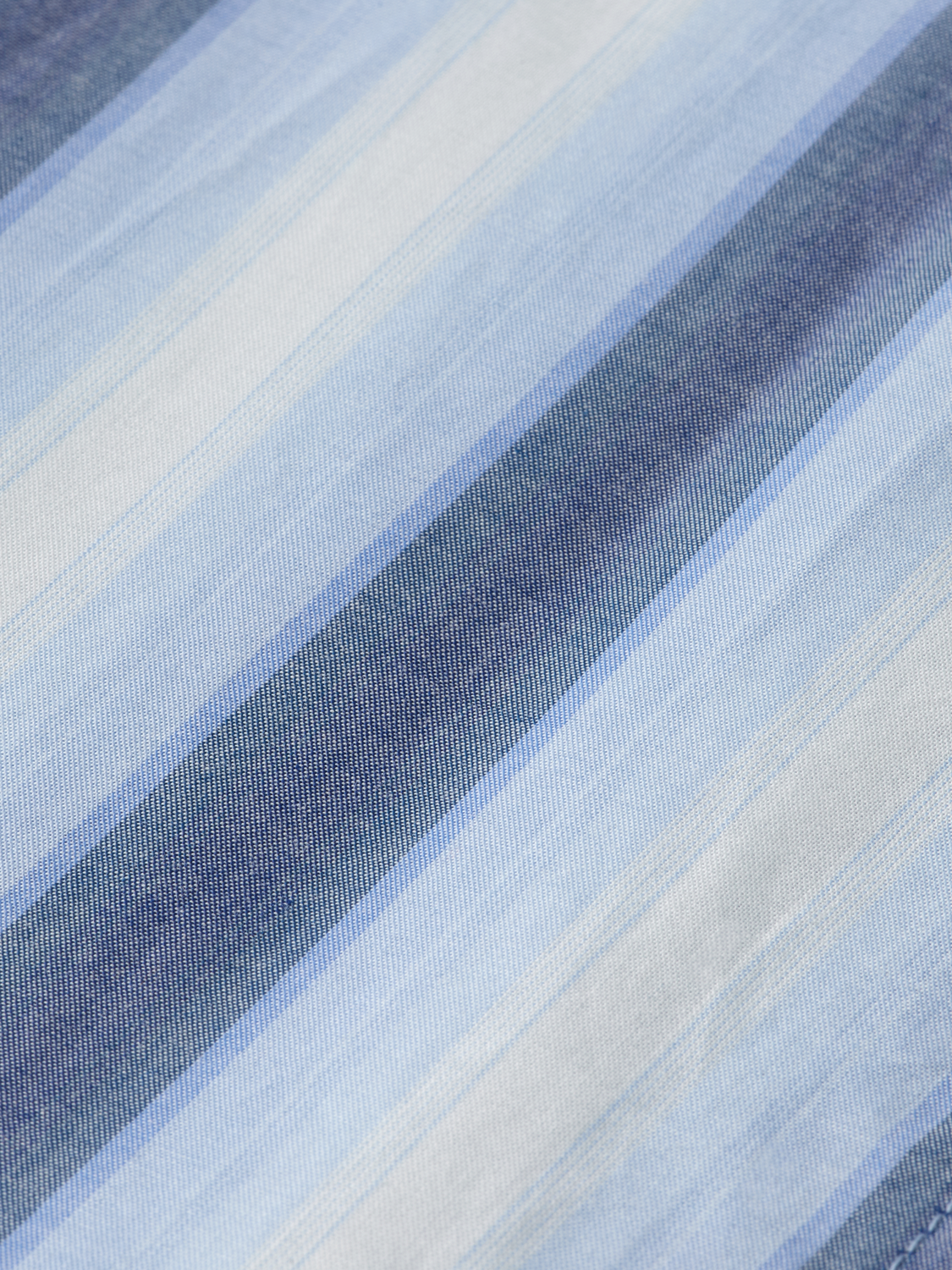 Long sleeve striped shirt by Scotch & Soda, featuring a classic pattern and casual fit, shown in a detailed front view.