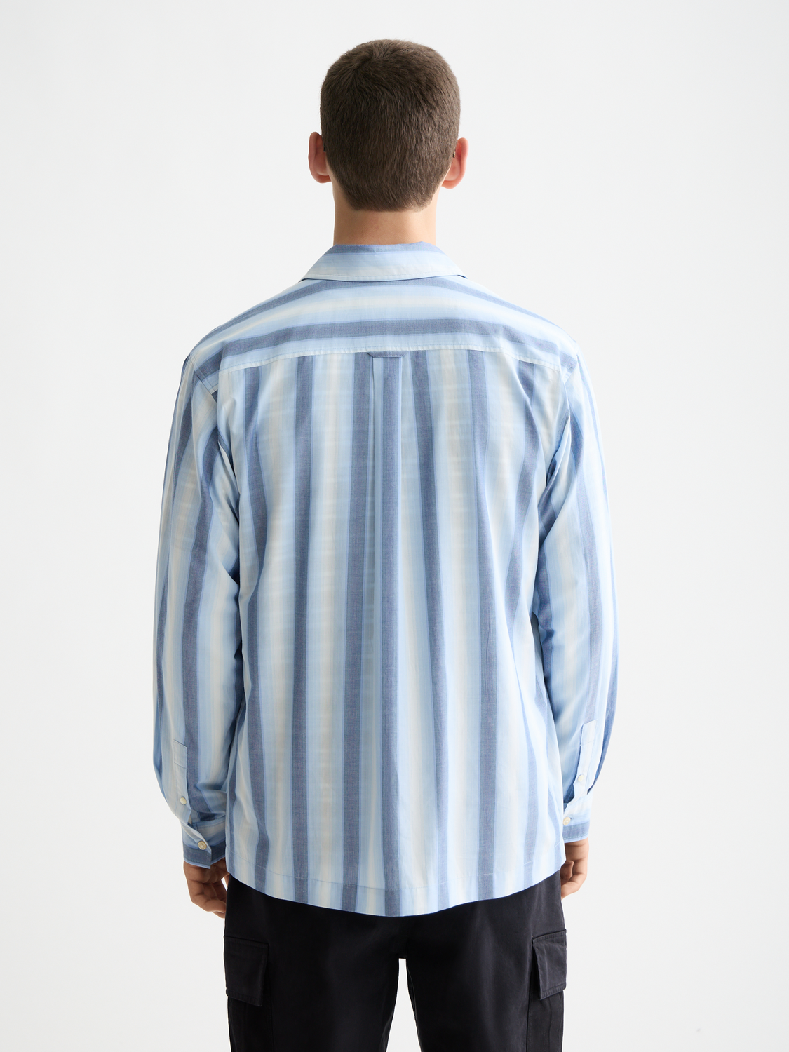 Long sleeve striped shirt by Scotch & Soda, showing the back view with red, white, and blue horizontal stripes.