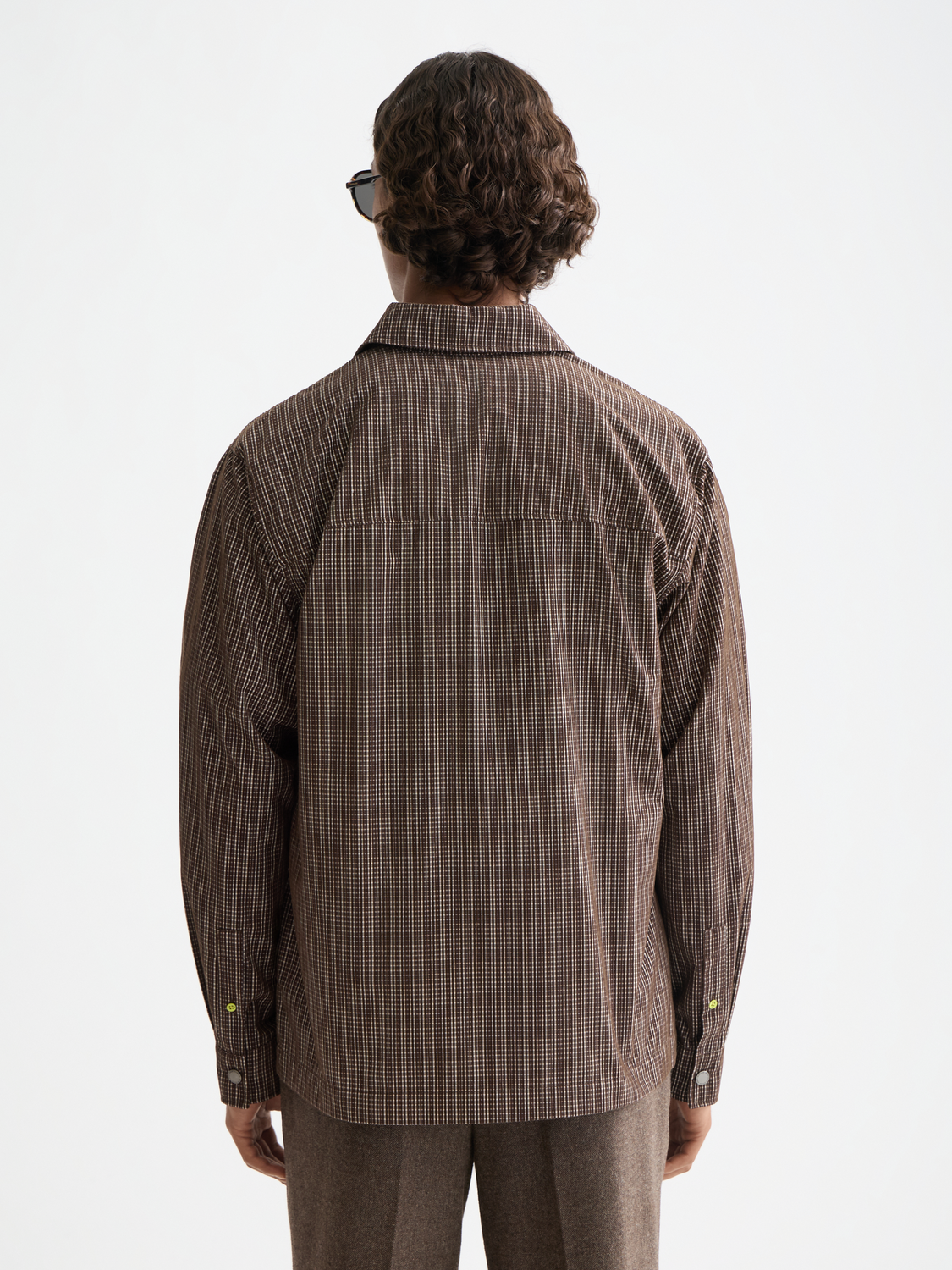 Long sleeve structured shirt by Scotch & Soda, shown from the back in a casual fit with detailed stitching and fabric texture.