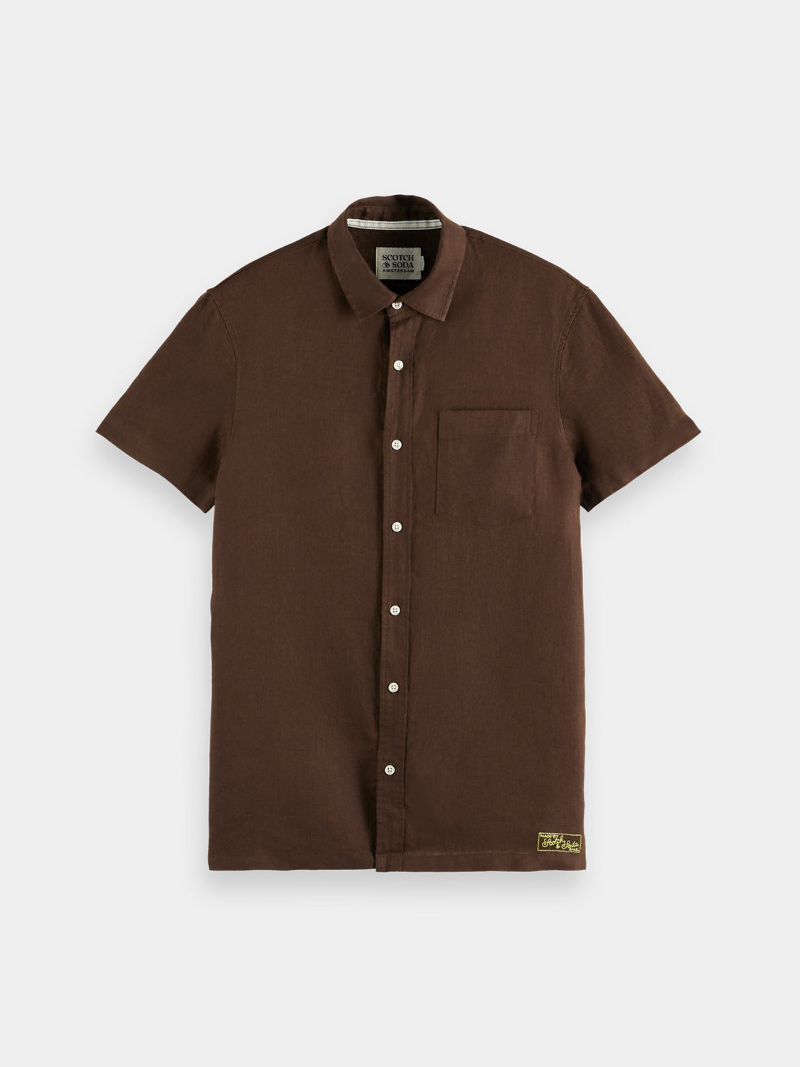 Light beige Scotch & Soda short-sleeved linen shirt with a button-down collar, displayed on a neutral background.