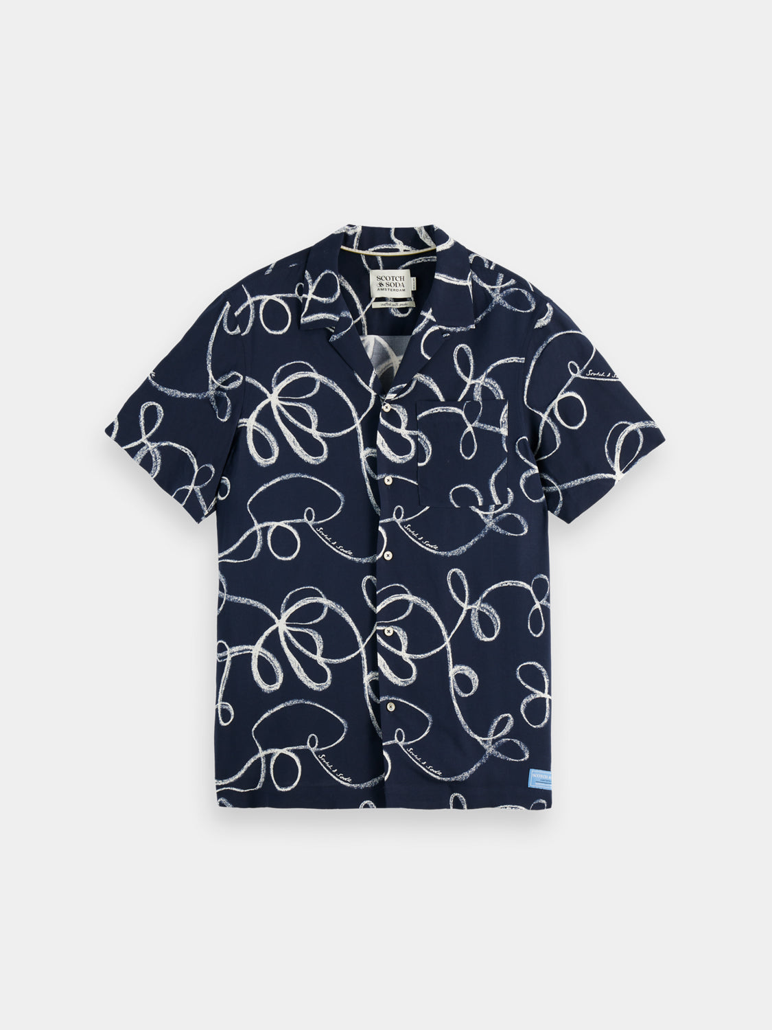 Printed short-sleeved shirt by Scotch & Soda featuring vibrant patterns, casual fit, and lightweight fabric for warm weather.