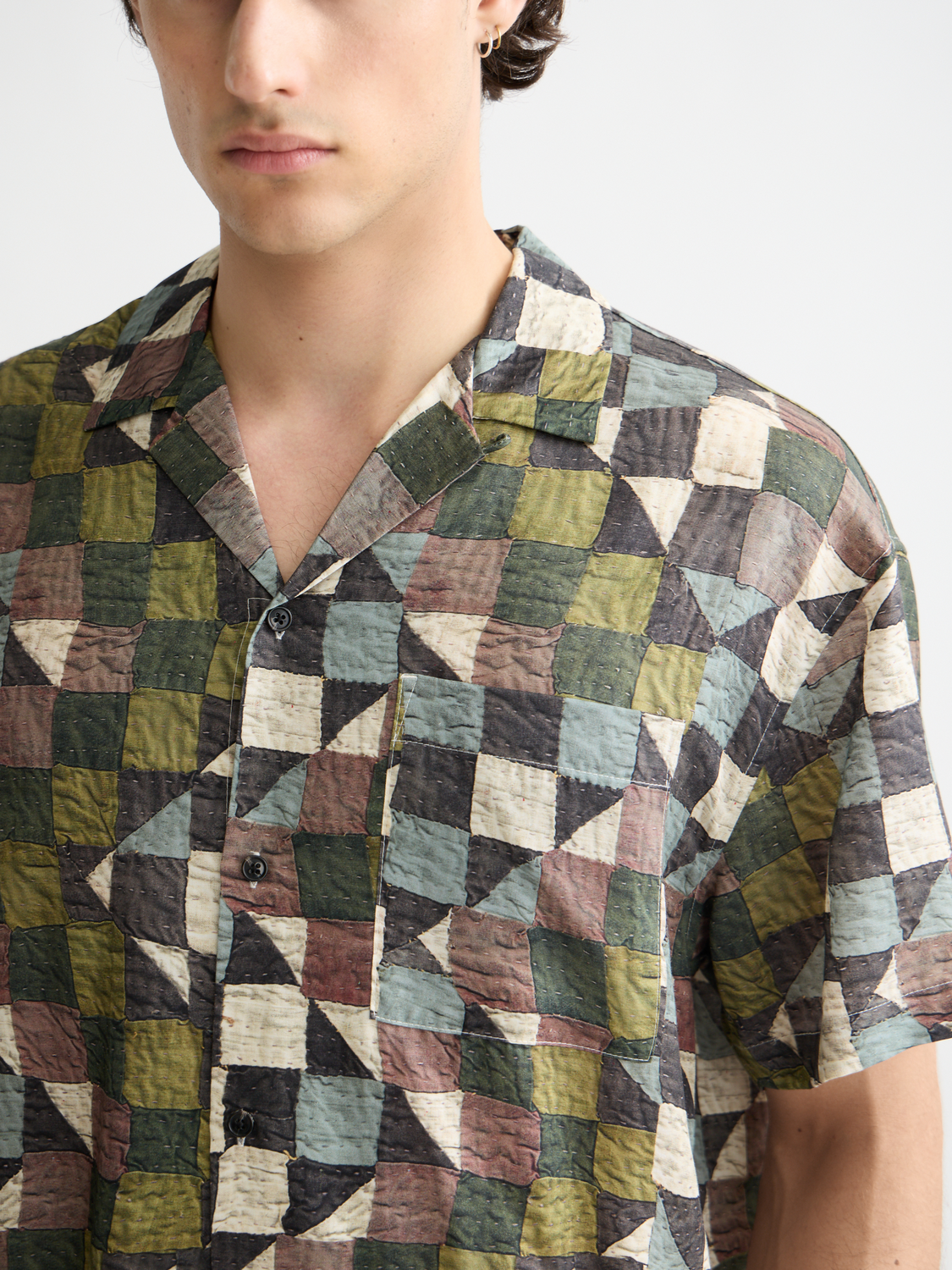 Printed short-sleeved shirt by Scotch & Soda with vibrant floral patterns and lightweight fabric, perfect for casual summer wear.