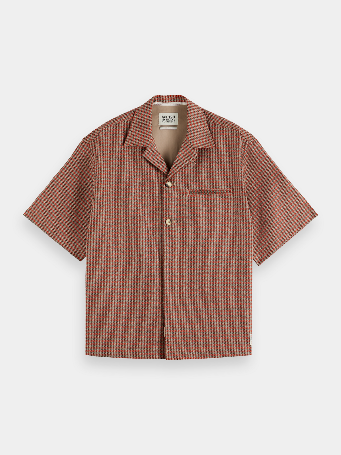 Printed short-sleeved shirt by Scotch & Soda, featuring vibrant patterns and a casual fit, ideal for warm weather.