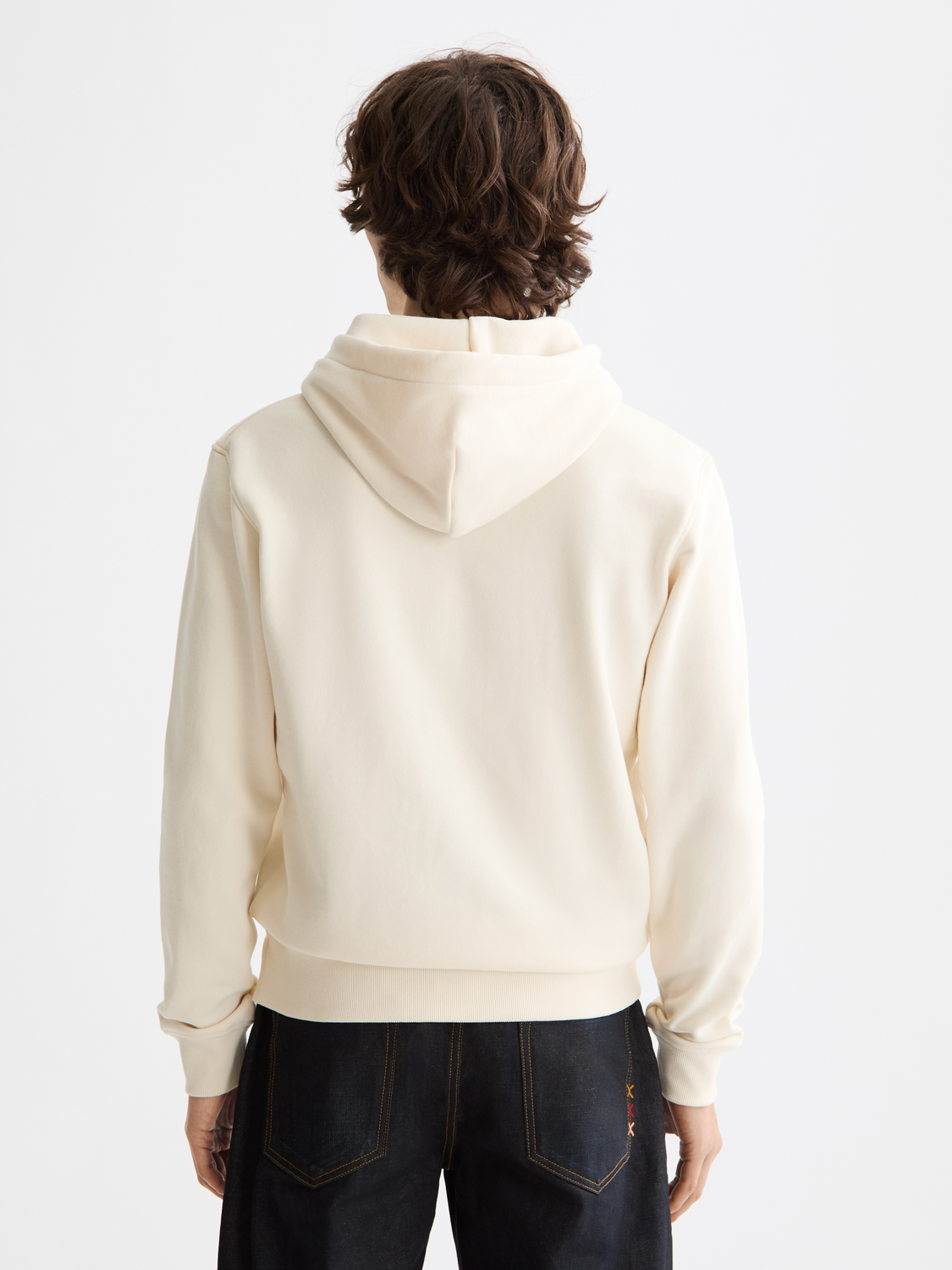 Dark gray hoodie with a prominent Scotch & Soda logo badge on the front, featuring a comfortable sweat fabric and hood.