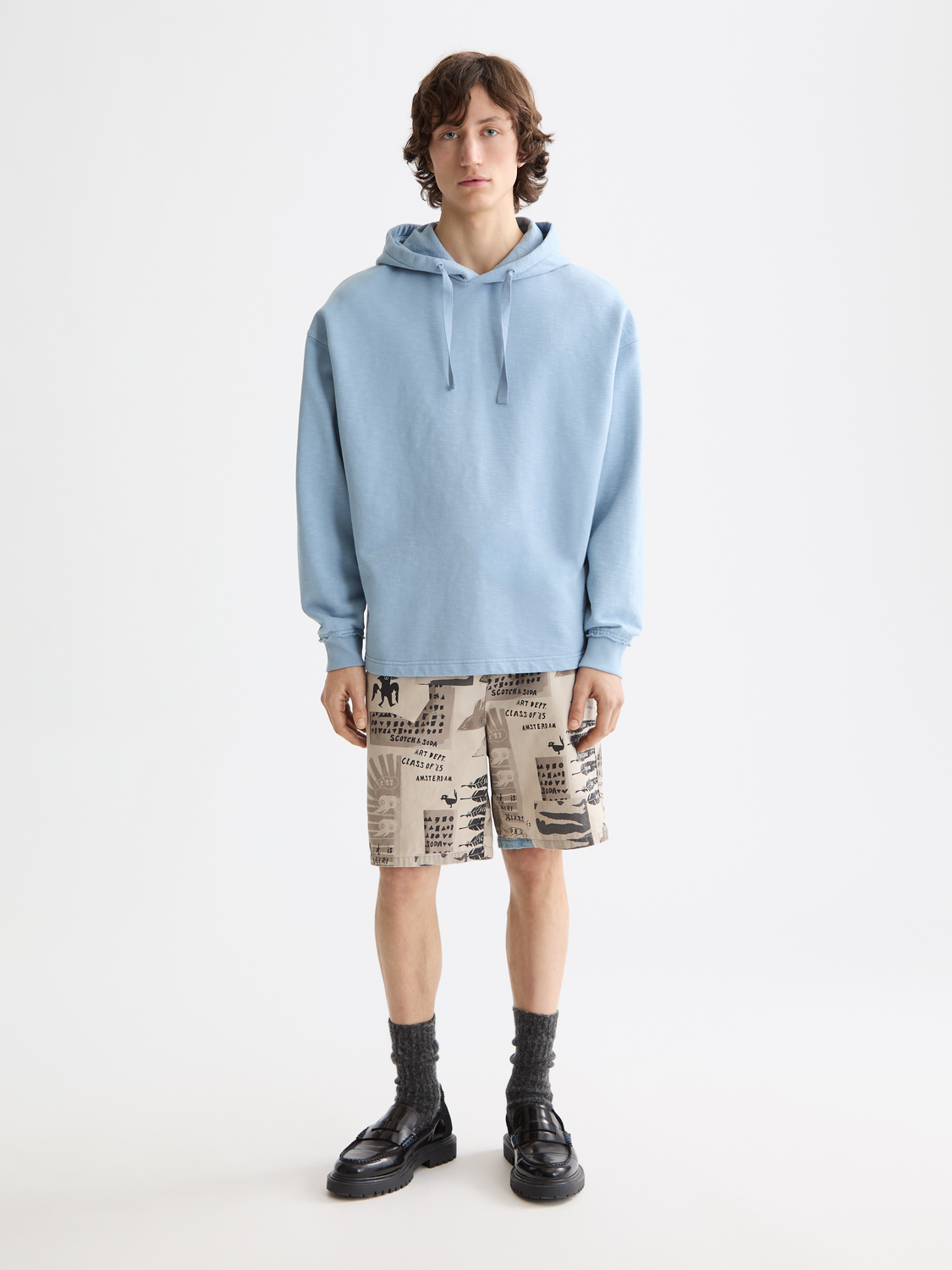 Garment-dyed hoodie from Scotch & Soda, casual sweats with a relaxed fit and soft fabric, shown in a front view.