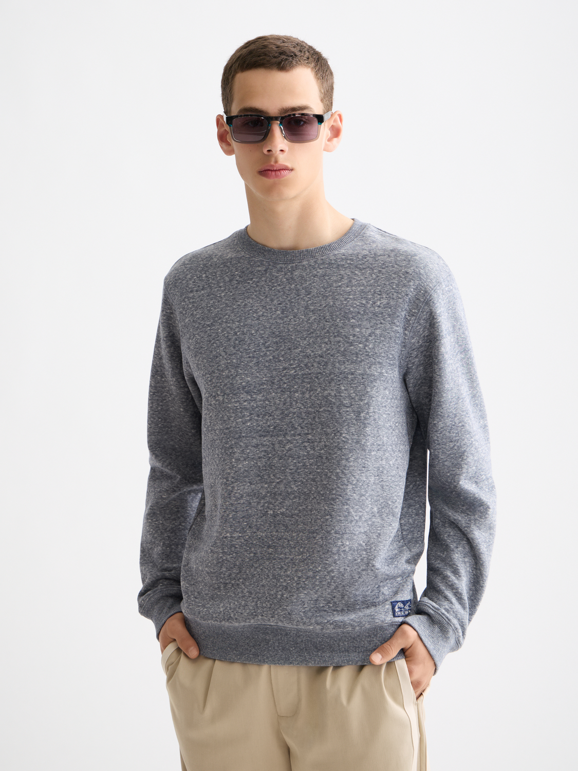 Scotch & Soda melange sweatshirt with a cozy knit texture and ribbed cuffs, front view showing stylish casual wear.