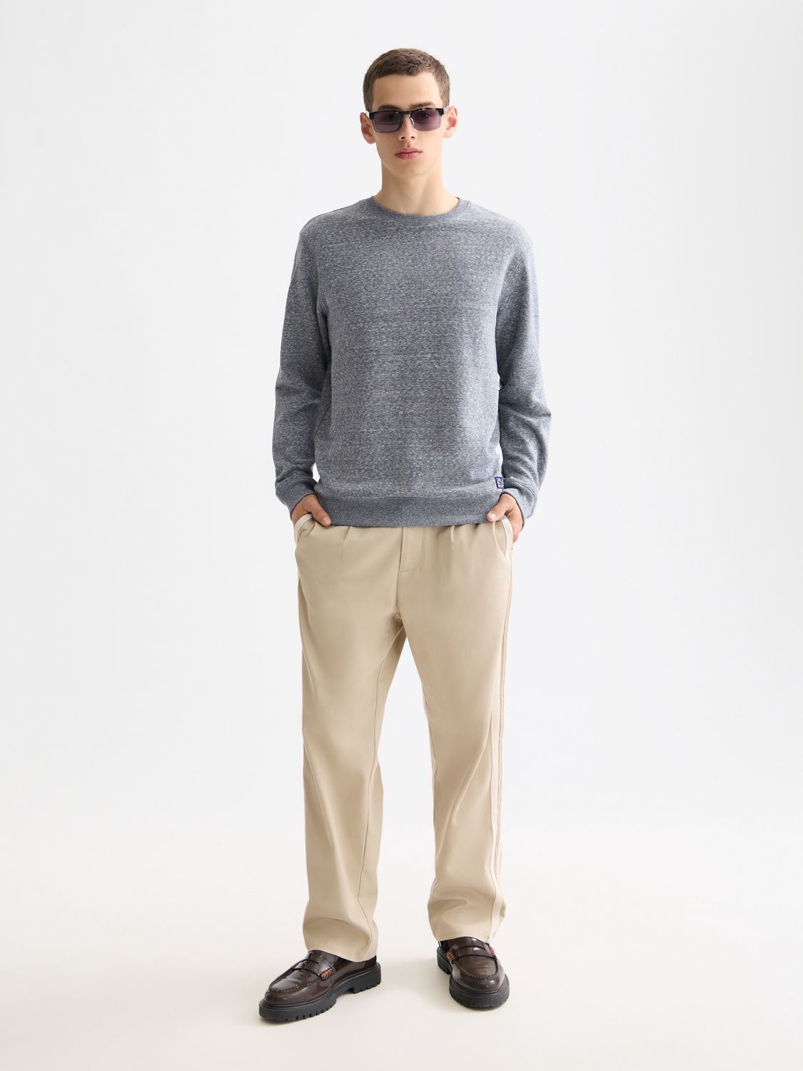 Scotch & Soda Melange sweatshirt with a cozy, textured knit fabric, featuring a relaxed fit and casual style.