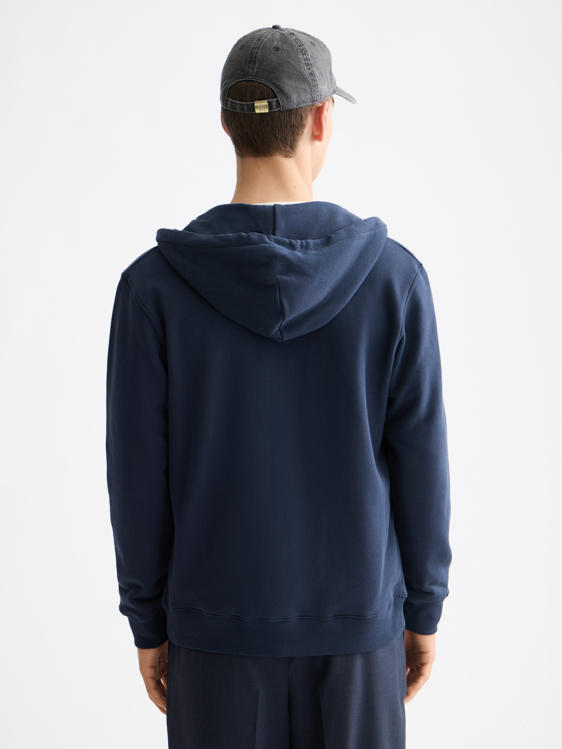 Black zip-through logo hoodie from Scotch & Soda, soft cotton sweats with front zipper and brand logo detail.
