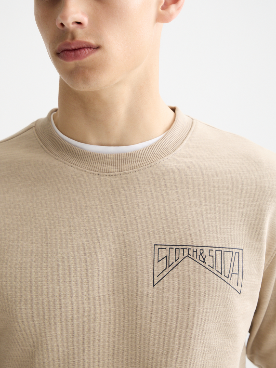Scotch & Soda chest logo sweatshirt showing a cozy navy sweats with a front logo detail and ribbed cuffs and hem.