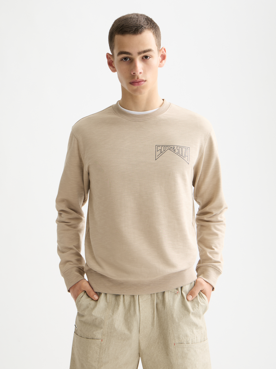 Gray Scotch & Soda chest logo sweatshirt with a front chest logo, soft fabric, and classic crewneck design.