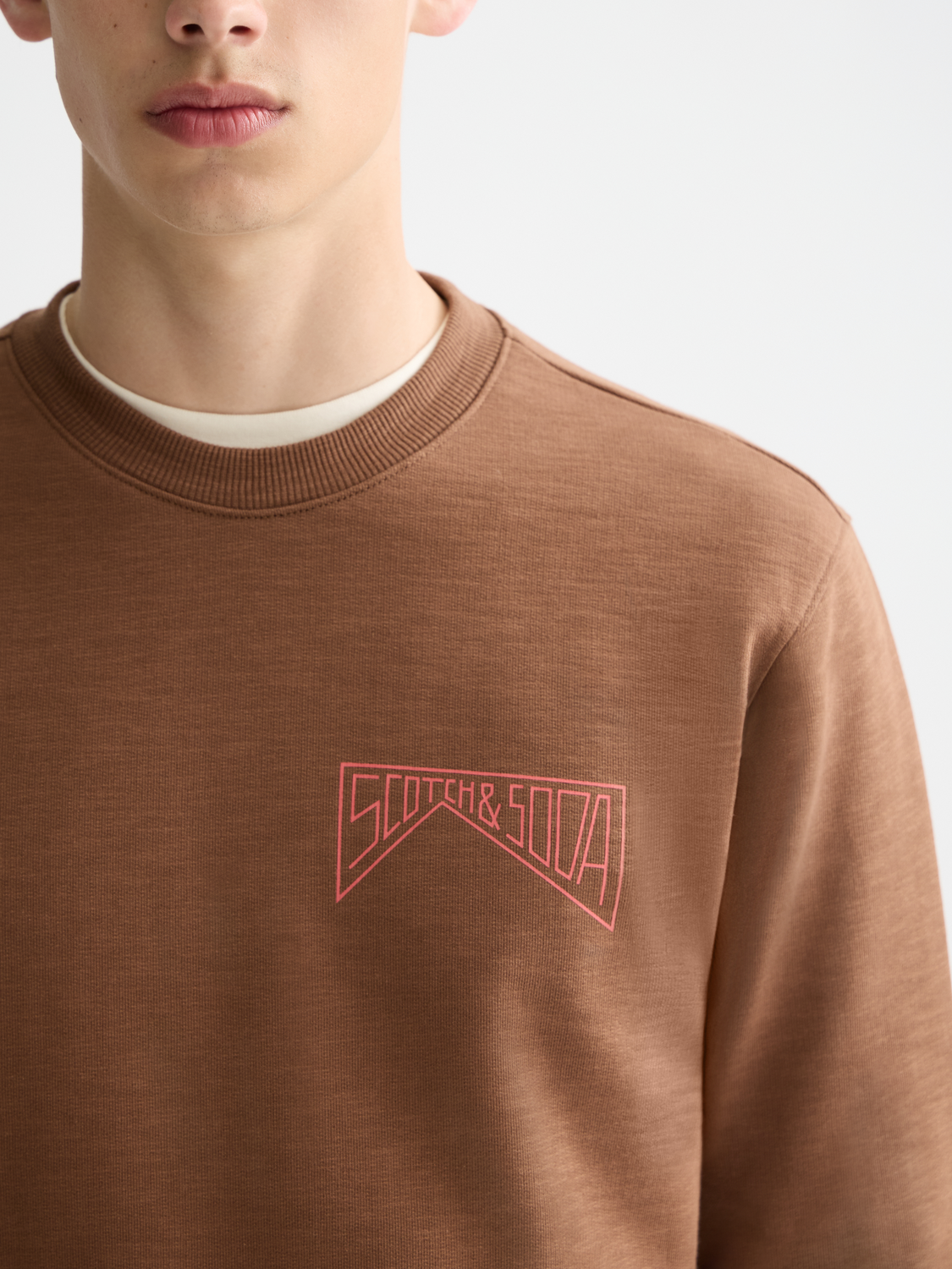 SCOTCH & SODA chest logo sweatshirt featuring a comfortable fit and stylish design, shown in a close-up image.