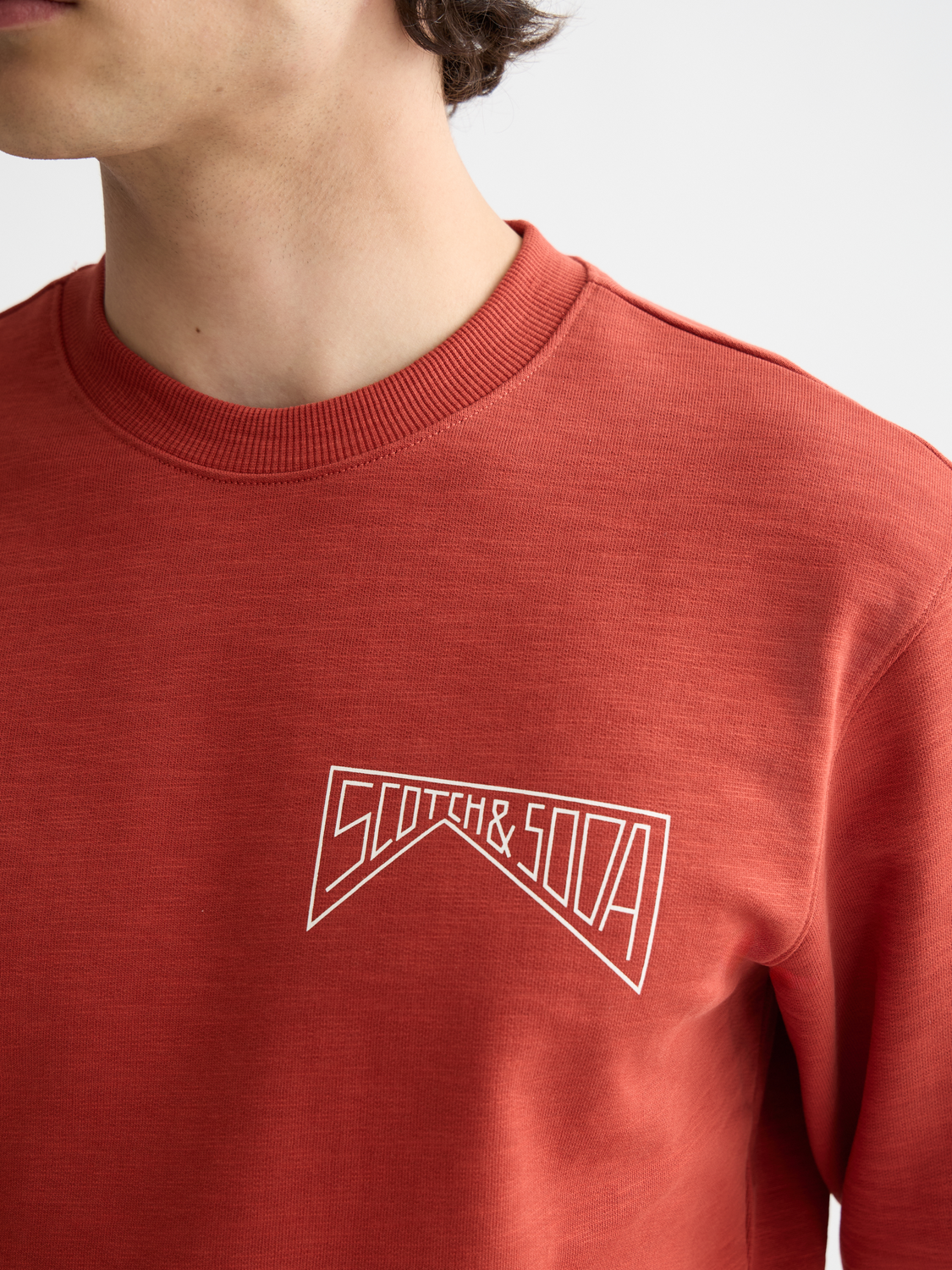 SCOTCH & SODA chest logo sweatshirt featuring a comfortable sweatshirt with a prominent logo on the front.