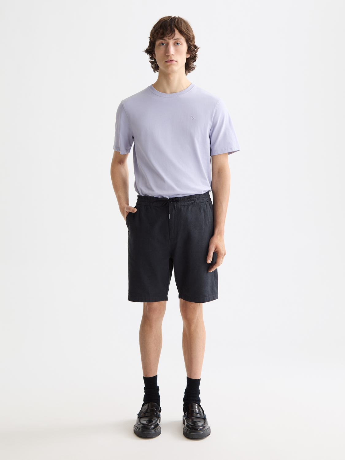 Black Scotch & Soda logo T-shirt with short sleeves, featuring a stylish front logo design on soft cotton fabric.