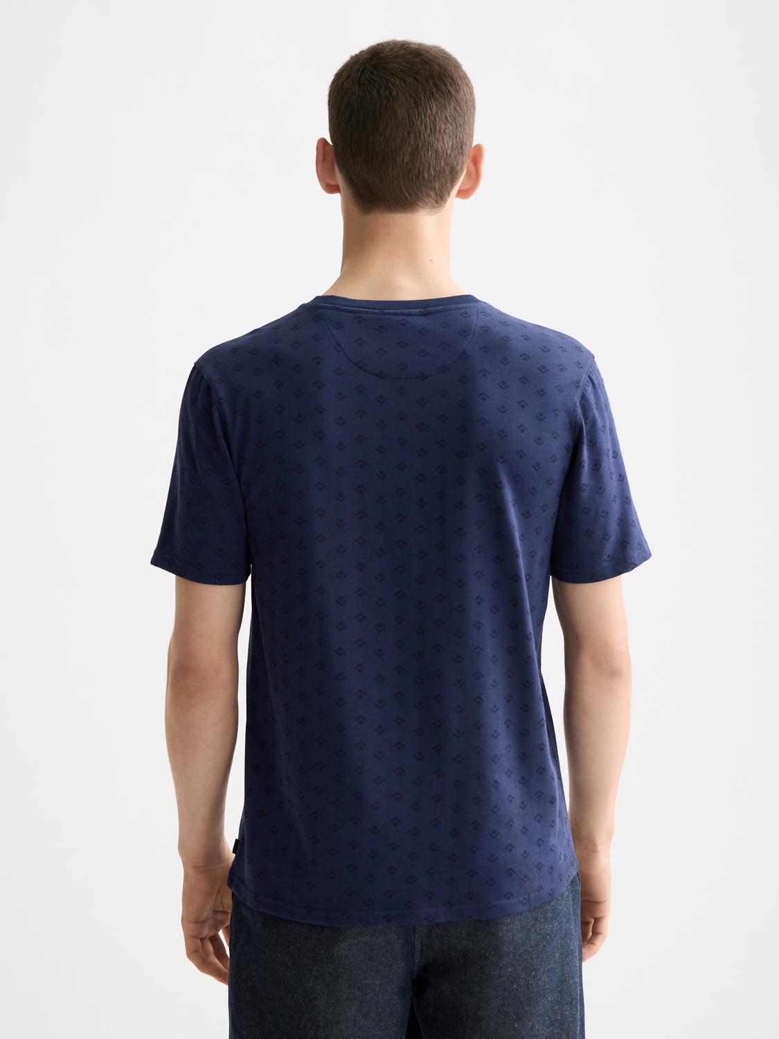 Printed Scotch & Soda short-sleeve t-shirt with graphic design, casual fit, and soft fabric, shown on a plain background.