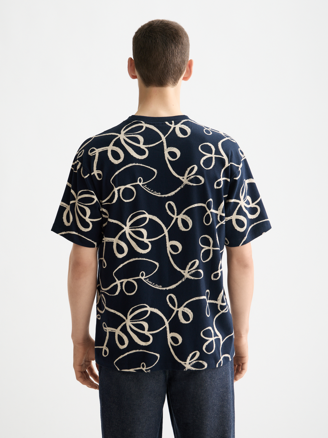 Printed Scotch & Soda short-sleeve t-shirt featuring vibrant graphic design on a casual crew neck.