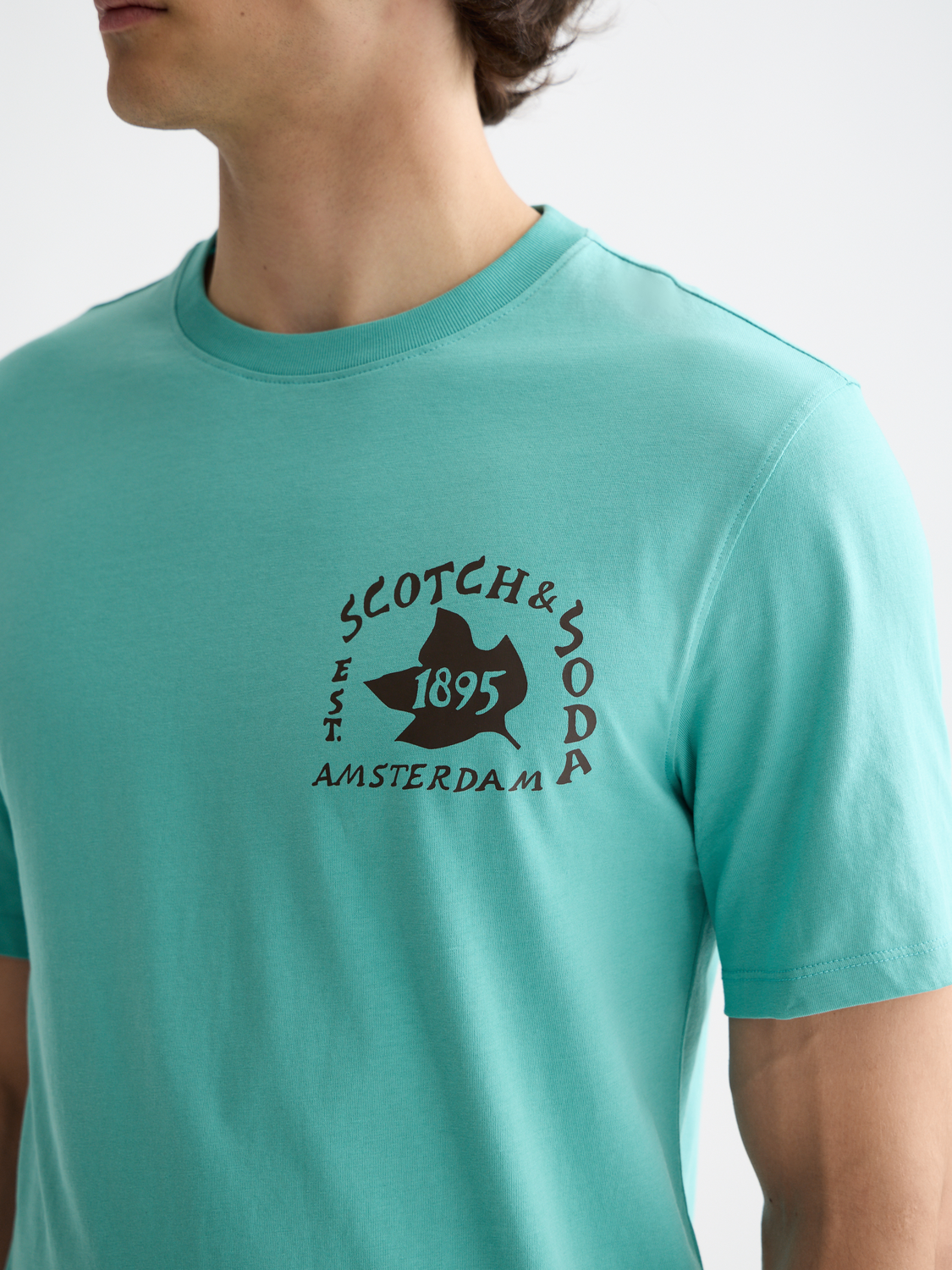Short sleeve artwork t-shirt by Scotch & Soda featuring a colorful graphic design on soft fabric.