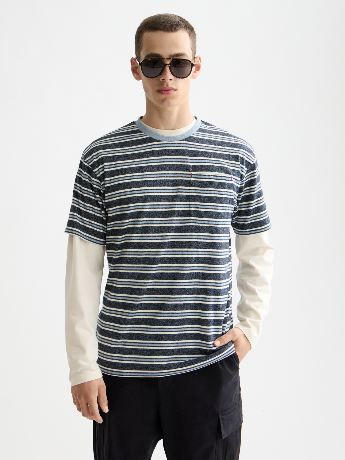 Yarn-dyed striped Scotch & Soda short-sleeve t-shirt with vibrant multicolor stripes, casual fit, and crew neckline.