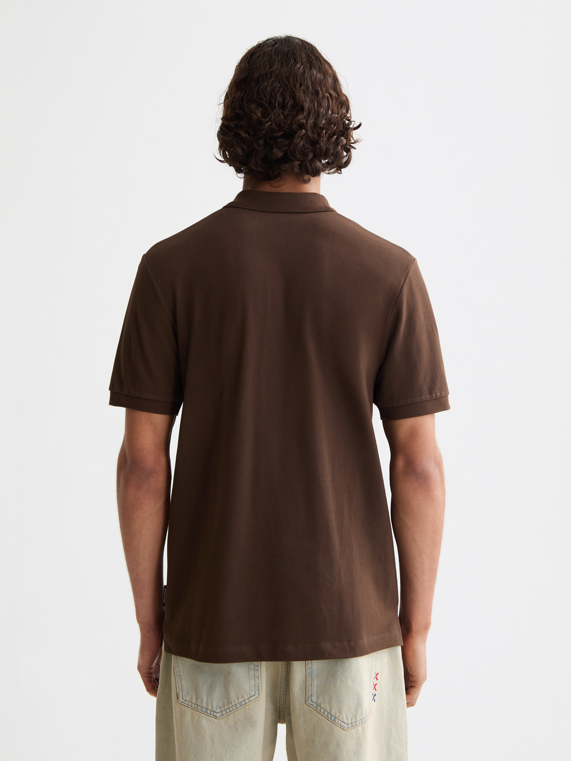 Regular-fit Scotch & Soda polo shirt in a classic design, shown from the back with a smooth fabric and collar detail.