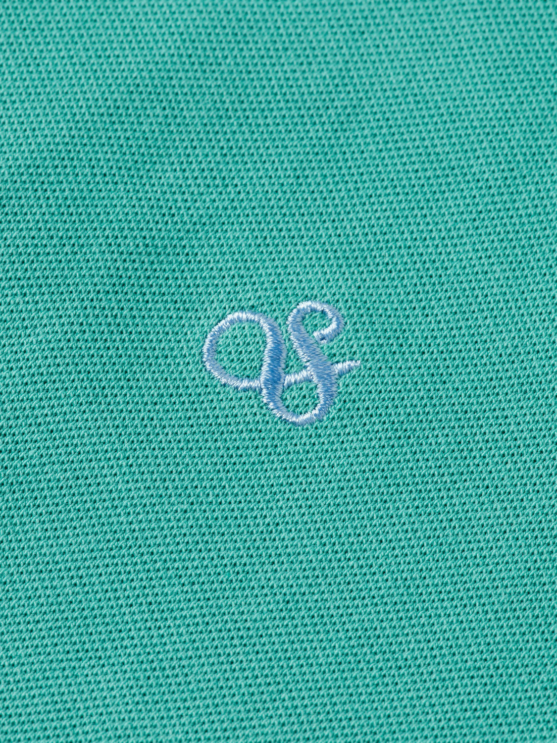 Regular-fit Scotch & Soda polo shirt in classic design, shown on a hanger with a close-up of the fabric and collar details.