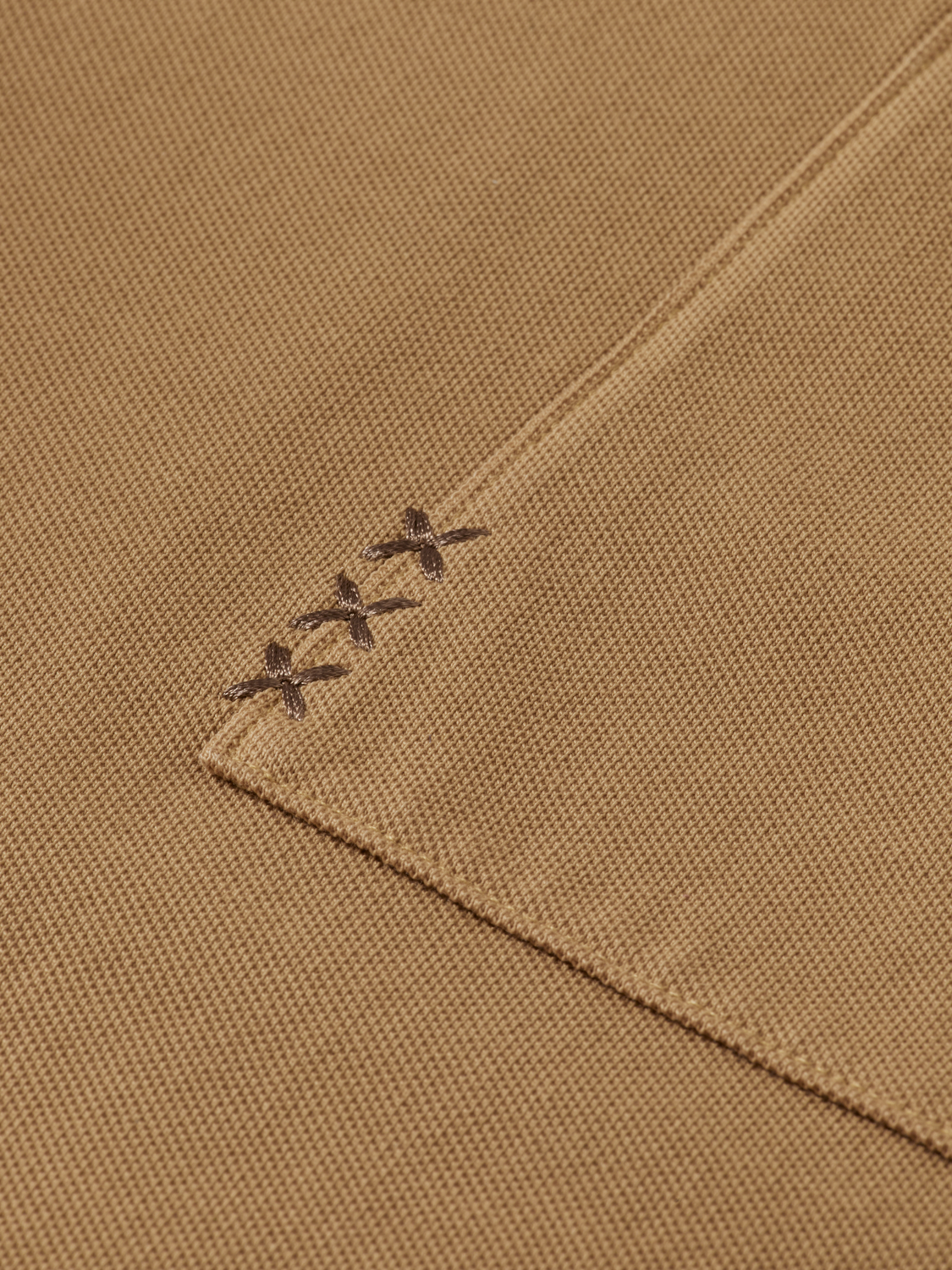 Scotch & Soda men's pique polo shirt in classic style, featuring a collared neckline and short sleeves.