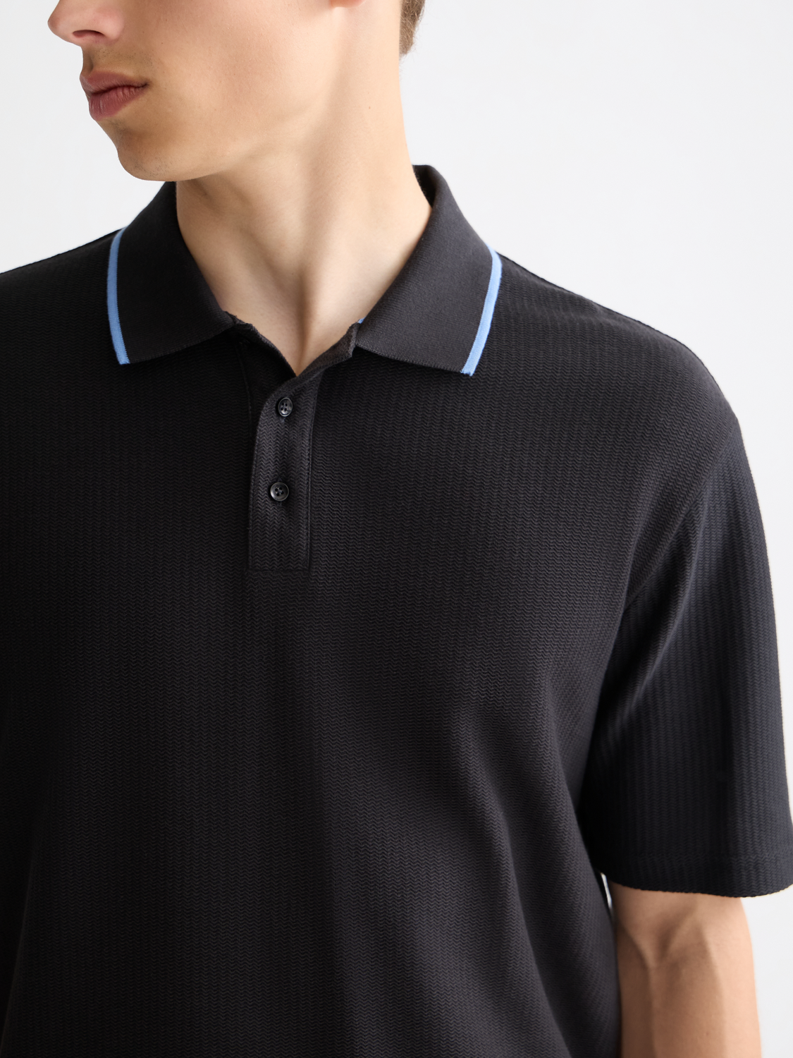 Structured polo shirt by Scotch & Soda, featuring a classic fit with a textured collar and short sleeves.
