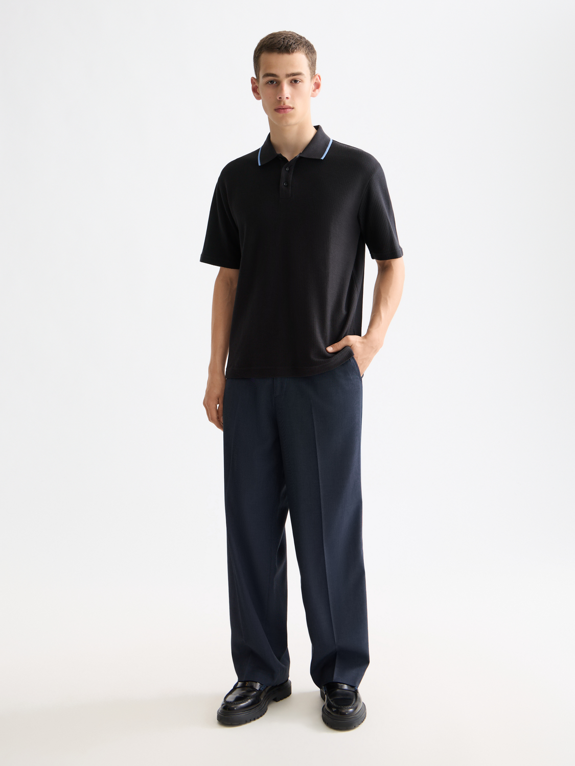Structured polo shirt from Scotch & Soda, featuring a classic collar and textured fabric in a stylish design.