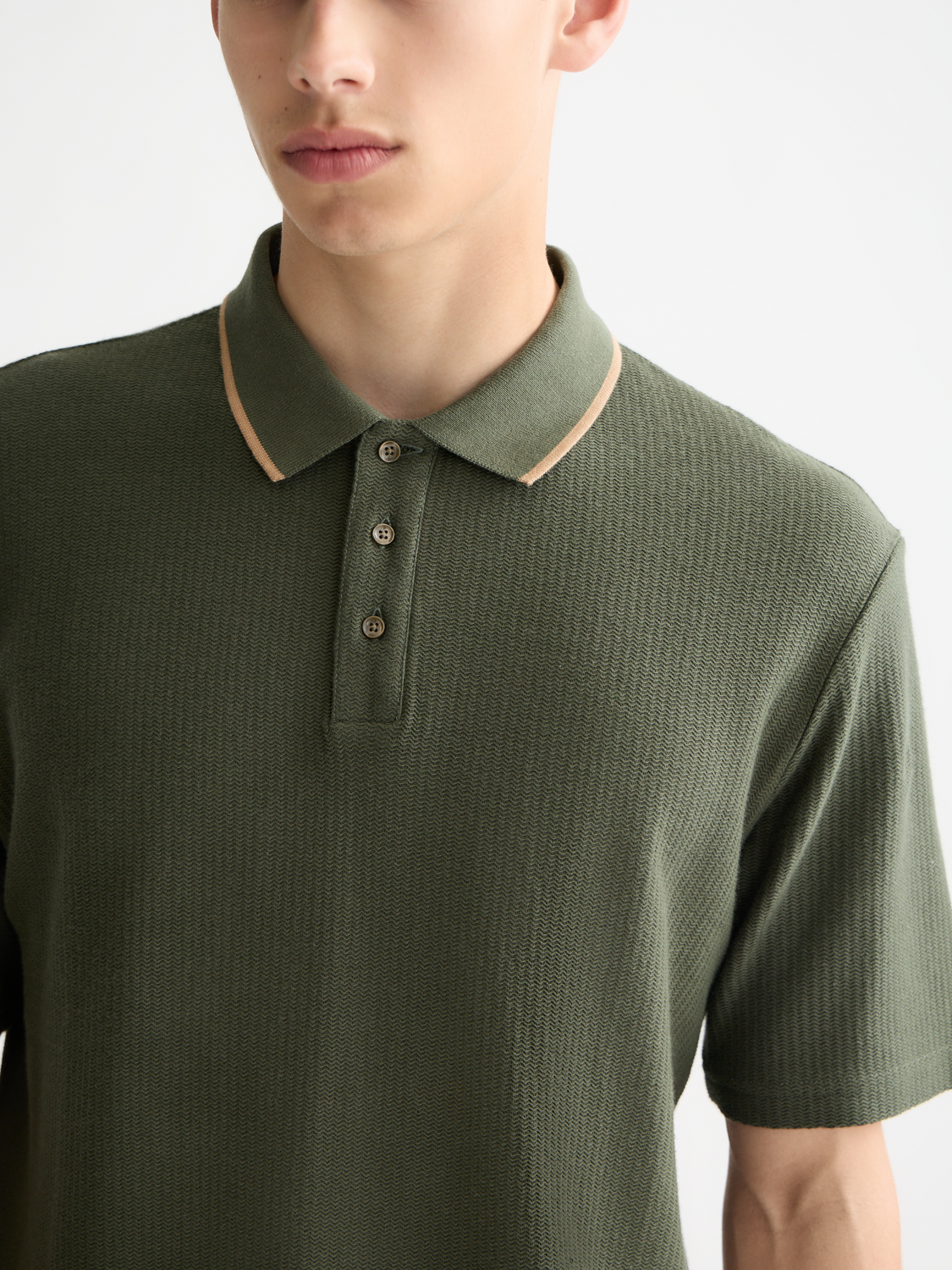 Structured Scotch & Soda polo shirt with a classic collar and short sleeves, displayed flat on a white background.