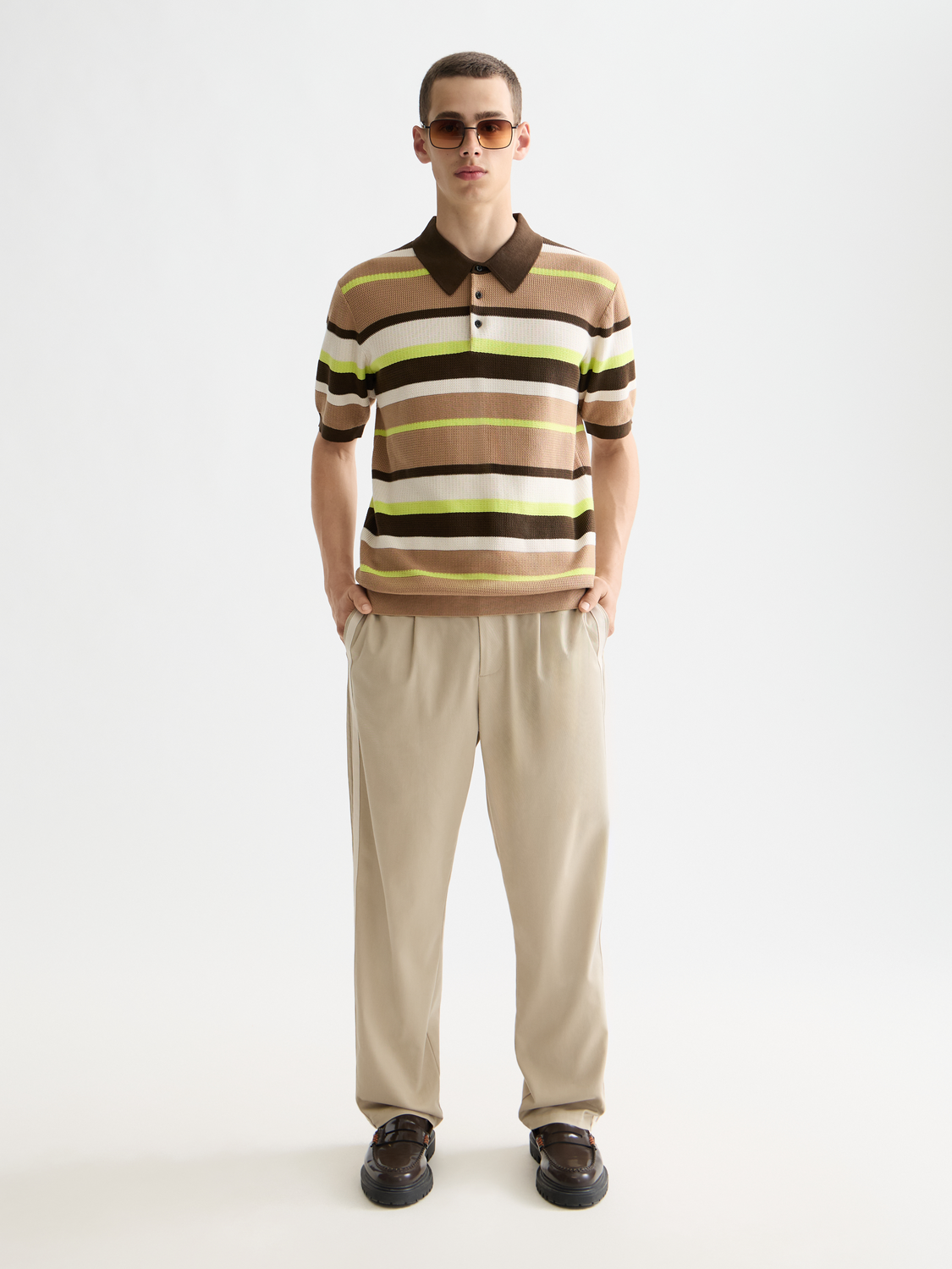 Scotch & Soda knitted striped polo shirt in blue and white with a classic collar and short sleeves.
