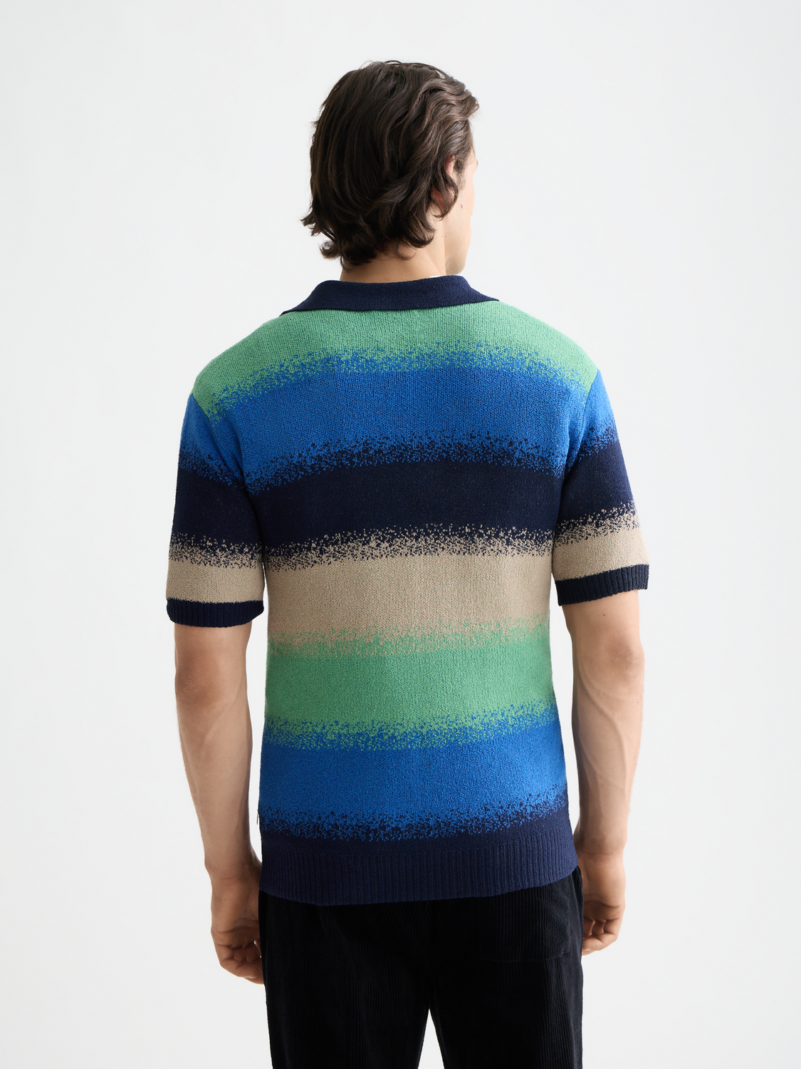 Knitted gradient polo shirt by Scotch & Soda featuring a multicolor striped pattern and classic polo collar.