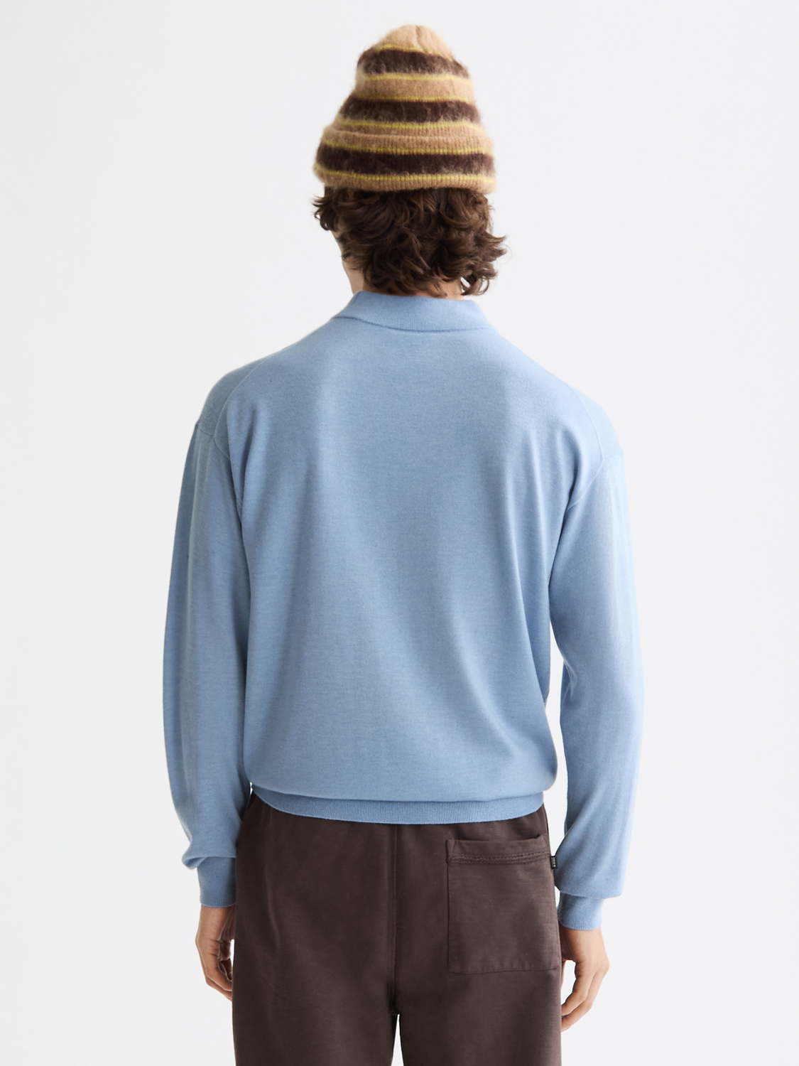 Blue Scotch & Soda knitwear mock neck pullover with ribbed cuffs and hem, displayed from the back.