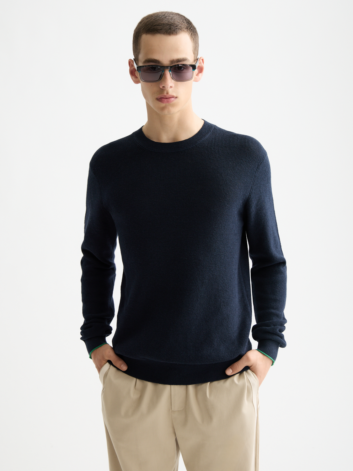 Scotch & Soda crewneck pullover knitwear in light pink with a ribbed collar and cuffs, displayed on a plain background.