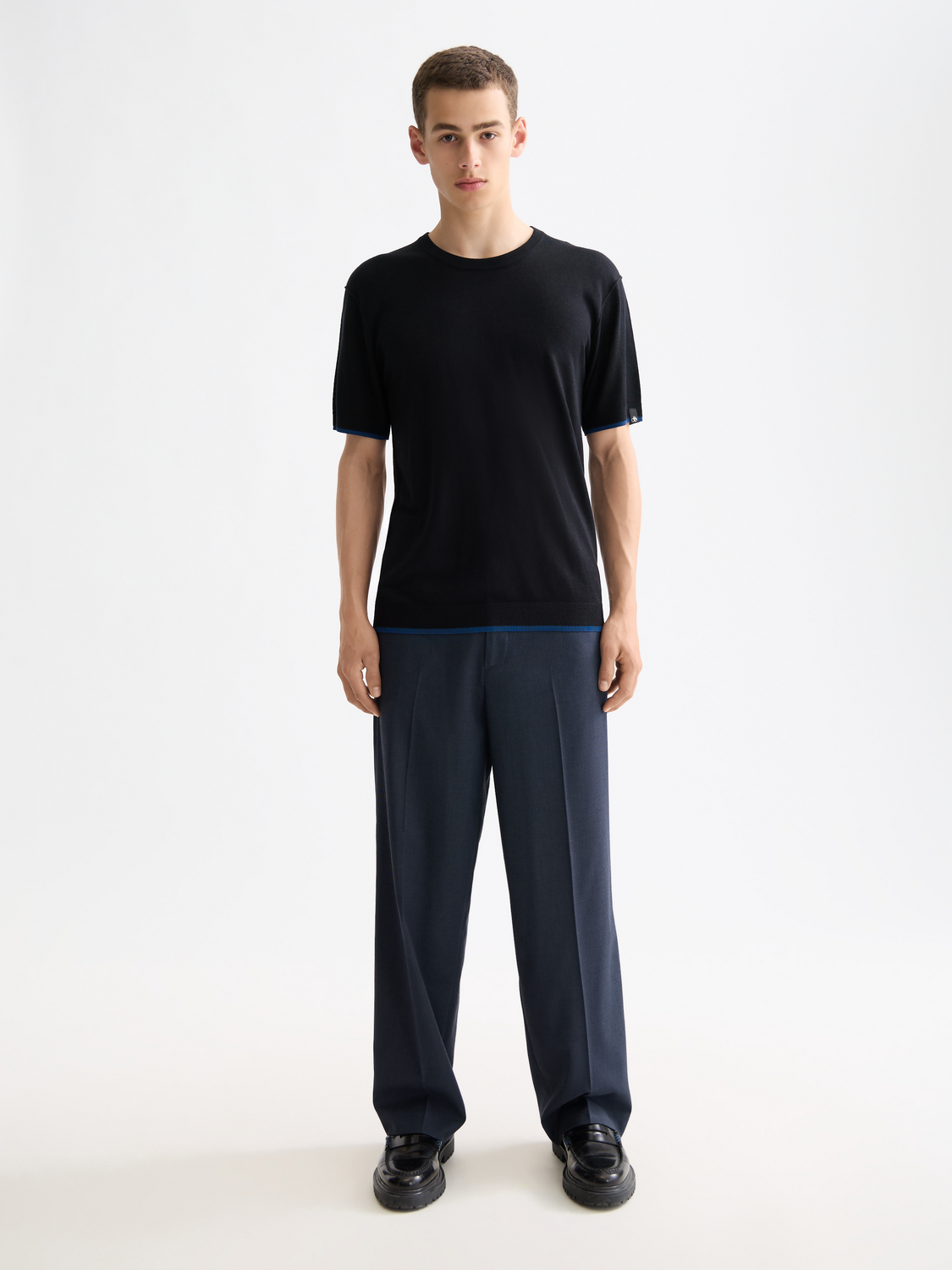Scarlet red knitted T-shirt by Scotch & Soda, featuring a classic crew neckline and textured knit fabric.